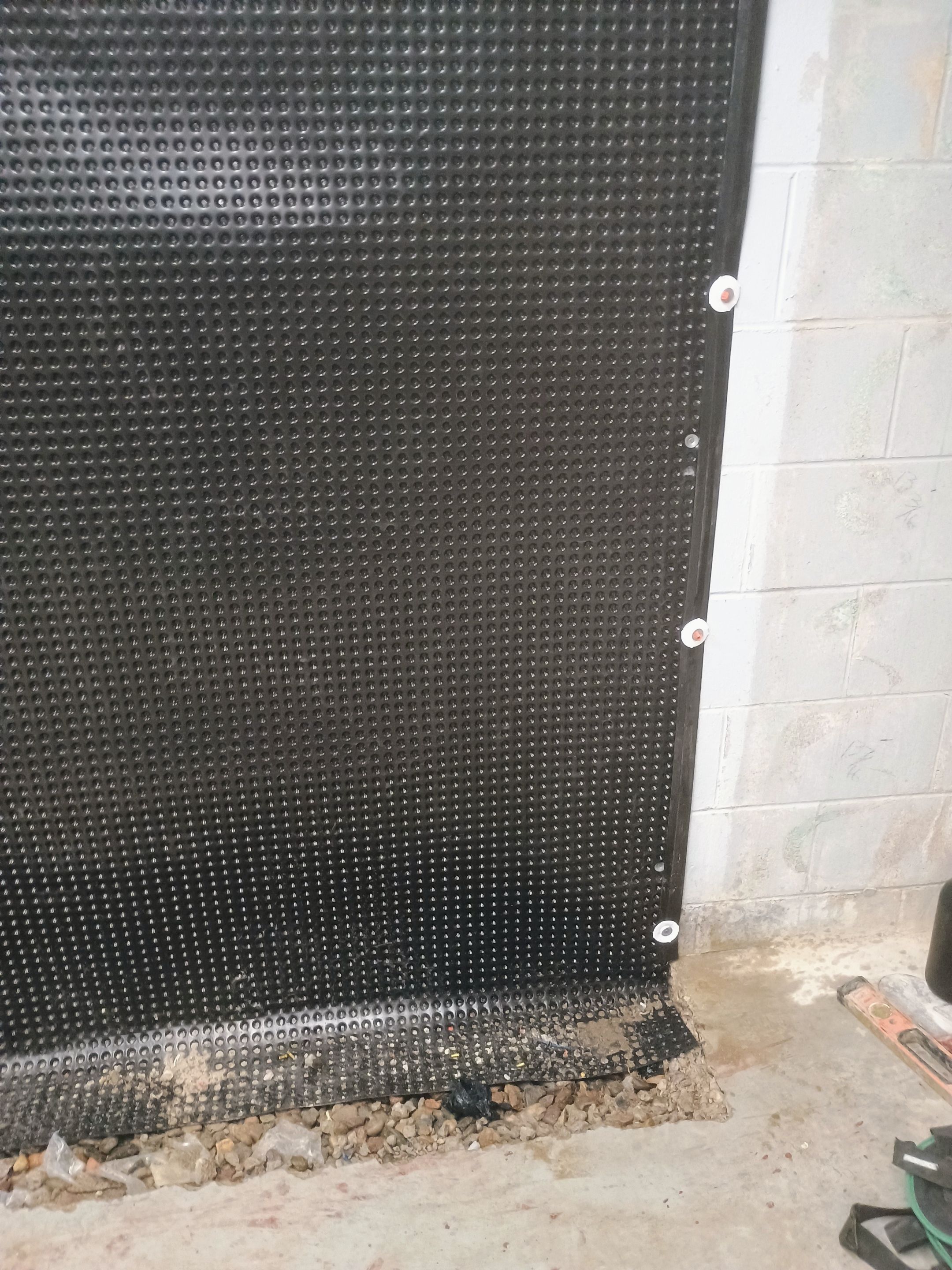 Depressurizing Denny's Basement Wall by Waterproofing Northeast