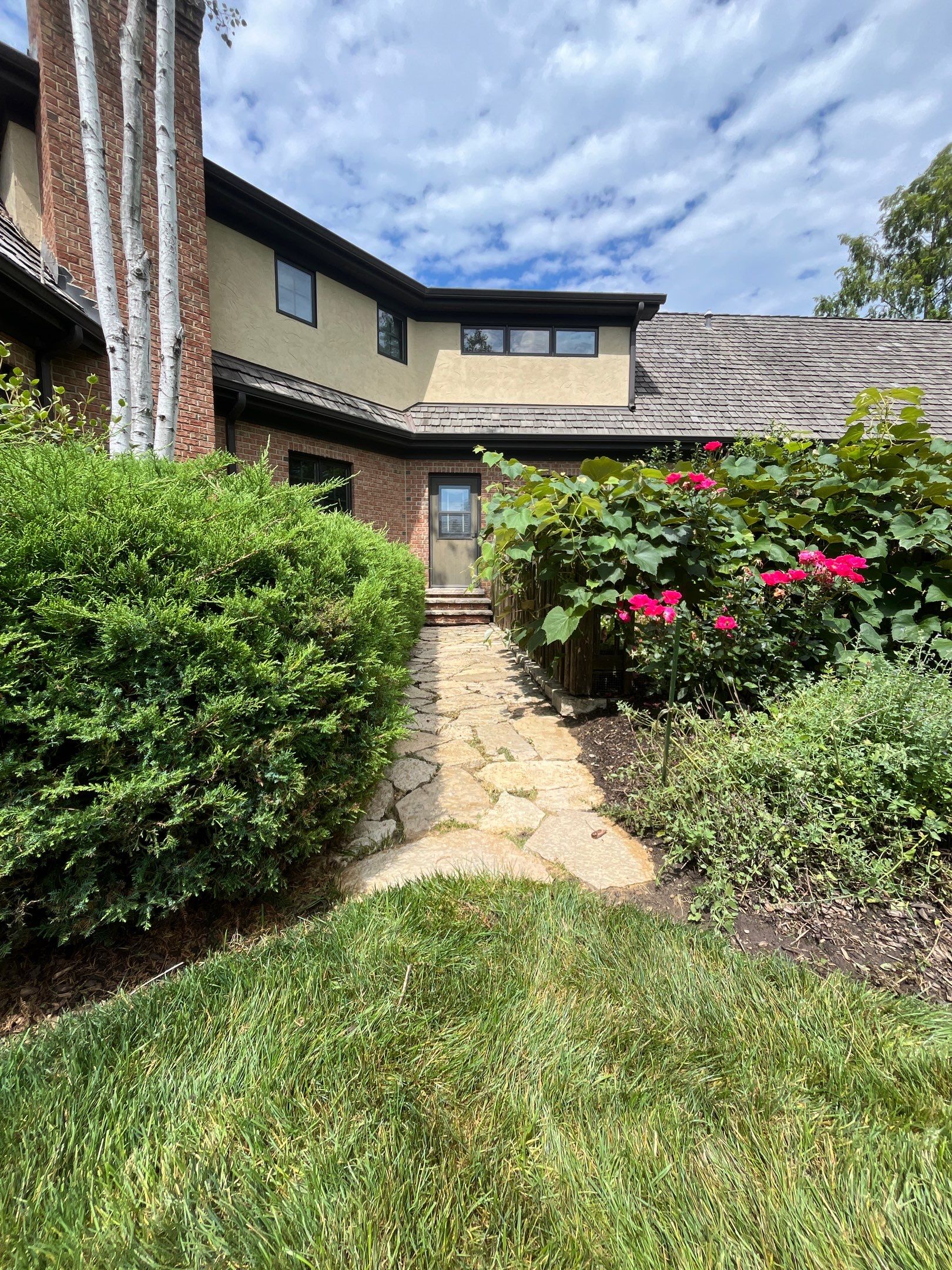 natural stone using Algaecide, soft wash soap by Northern Power Washing LLC.