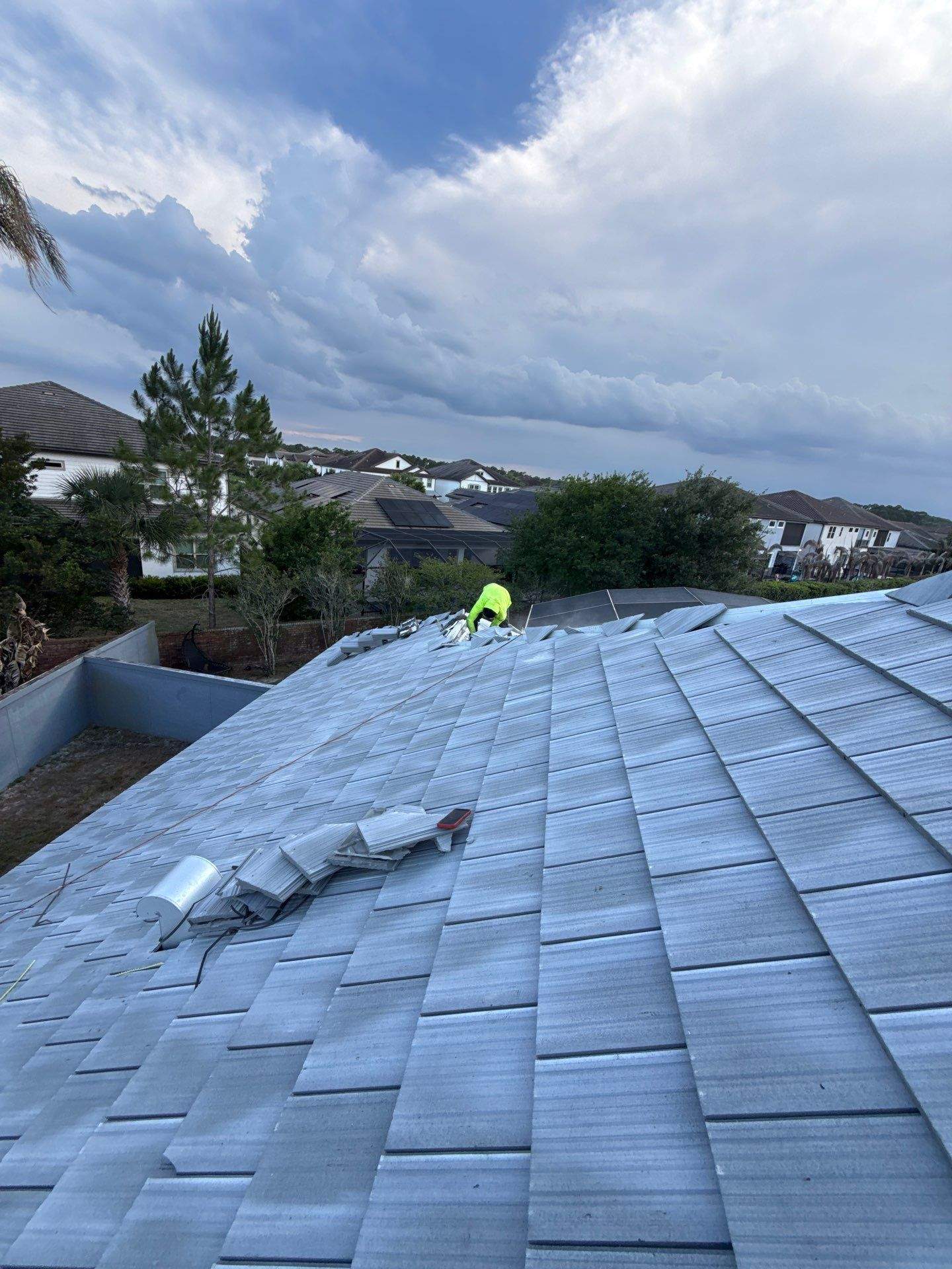 Winter Park Concrete Tile Roof Replacement and Chimney Flashing Installation by Fortified Roofing Solutions Corp.