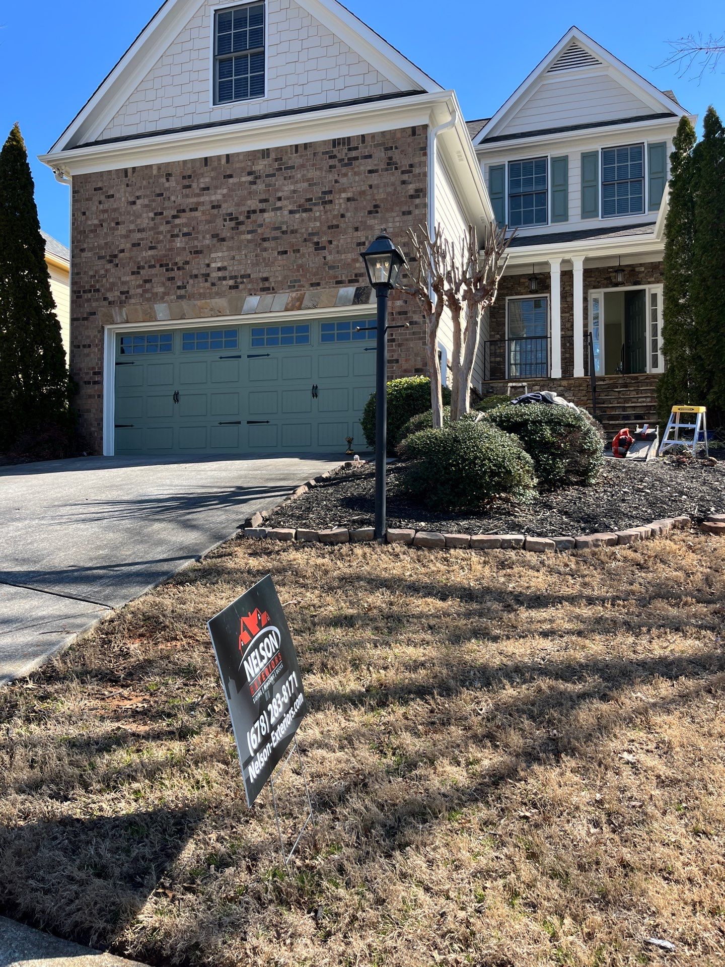 Garage Door and Home Exterior Painting and Rotten Wood Replacement in Marietta, GA by Nelson Exteriors