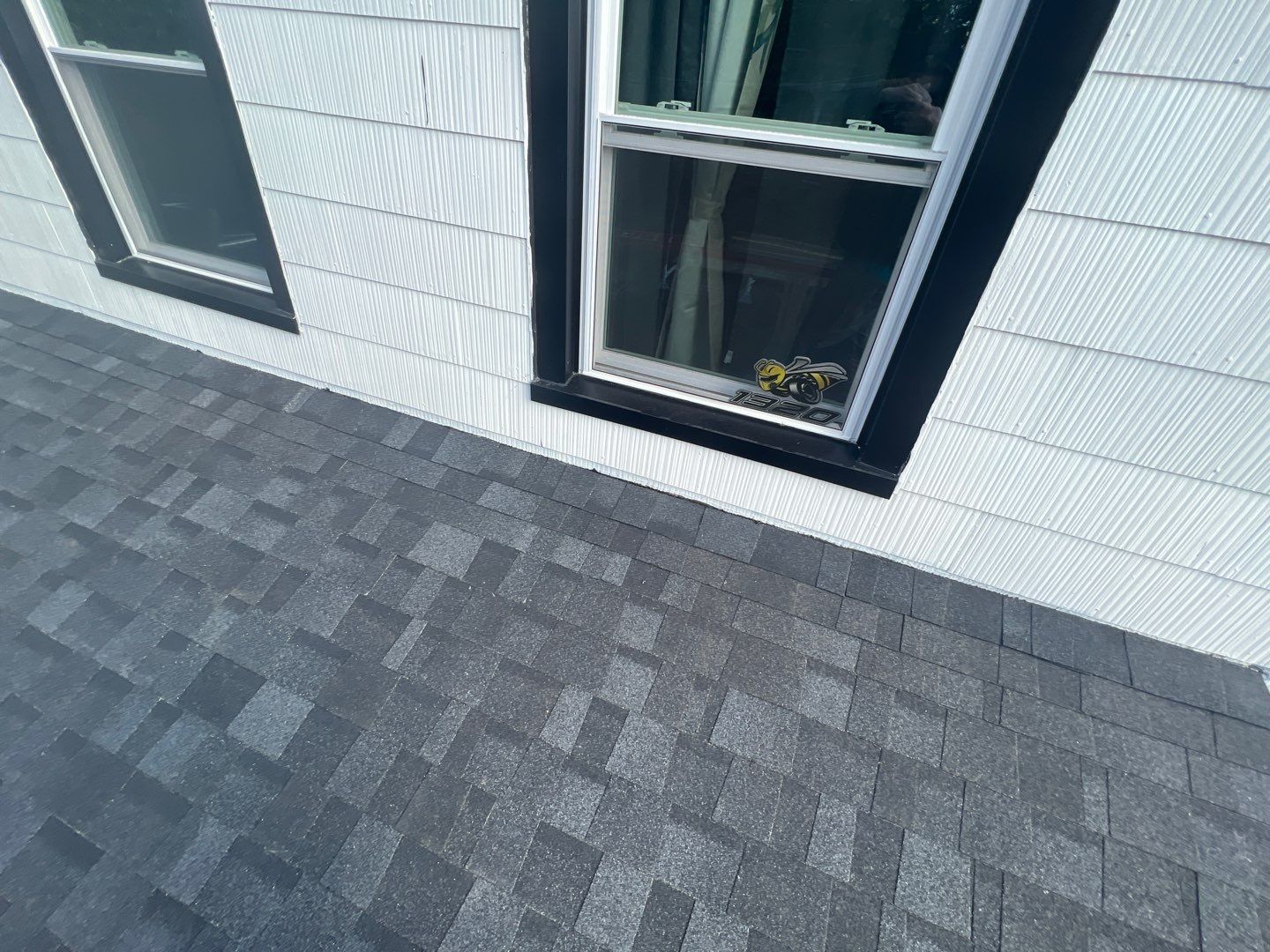 Onyx Black Shingles by Reimagine Roofing