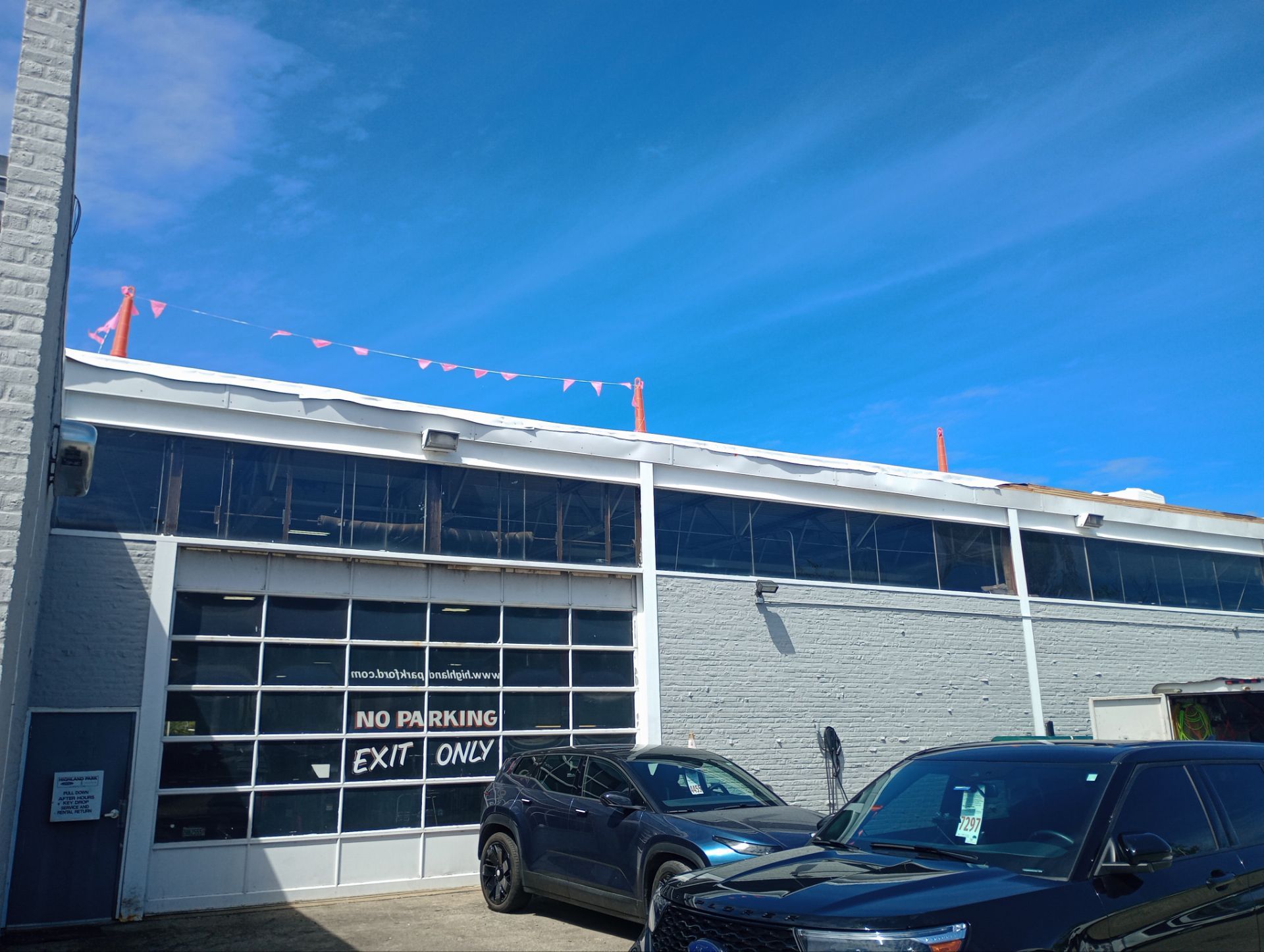Ford Dealership - Re-Roof by Pink Roofing