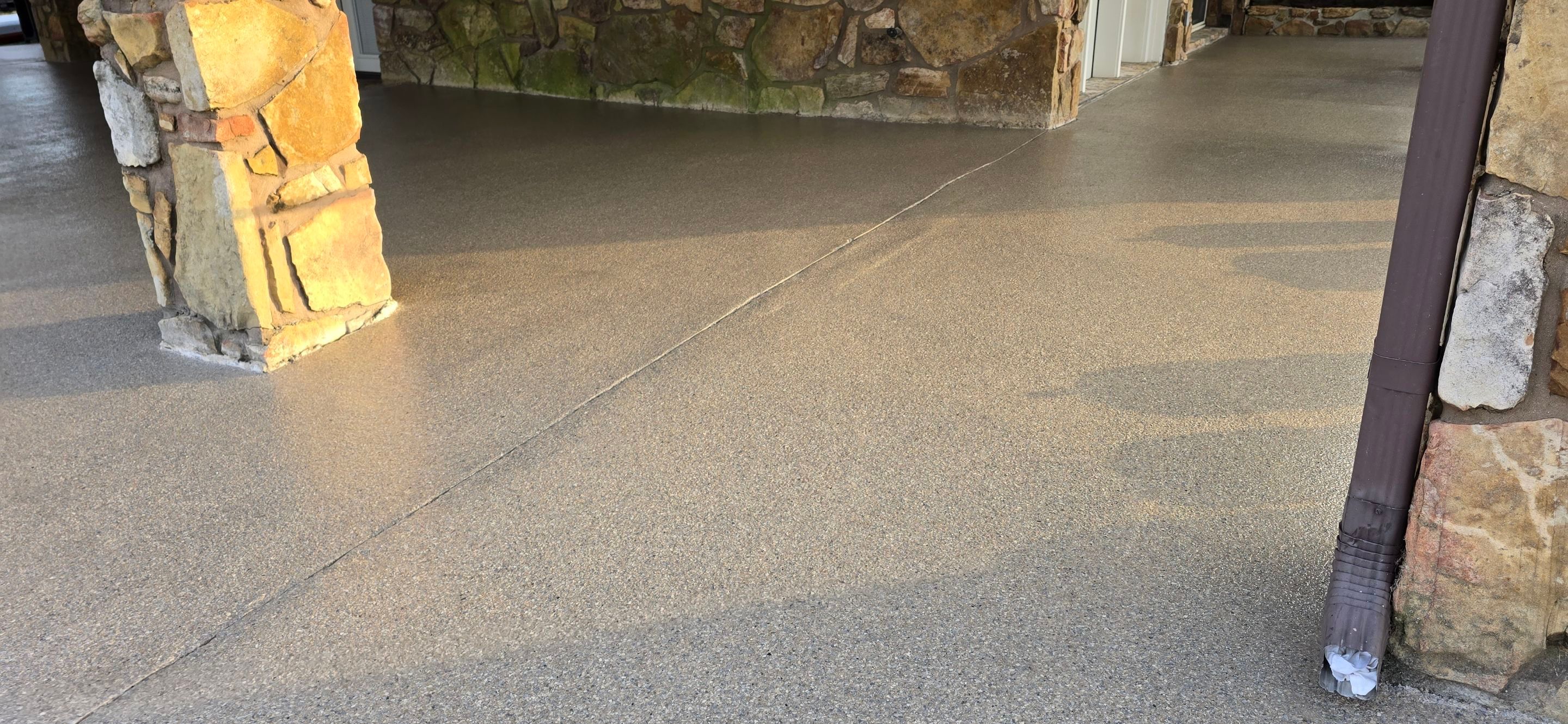 Back Patio using Obsidian by Elite Floor Solutions