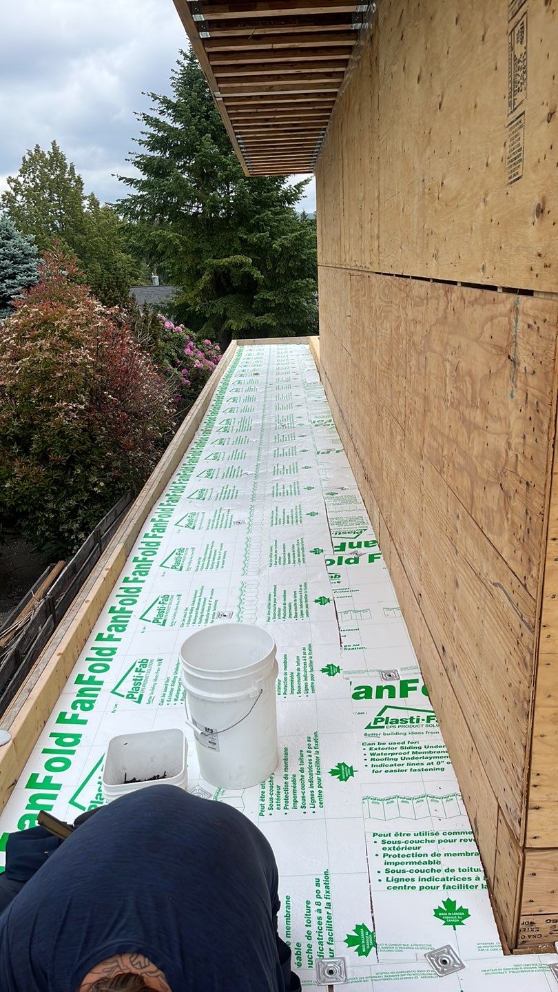 Residential Roofing Installation using Durolast roofing membrane by Top Notch Roofing Inc