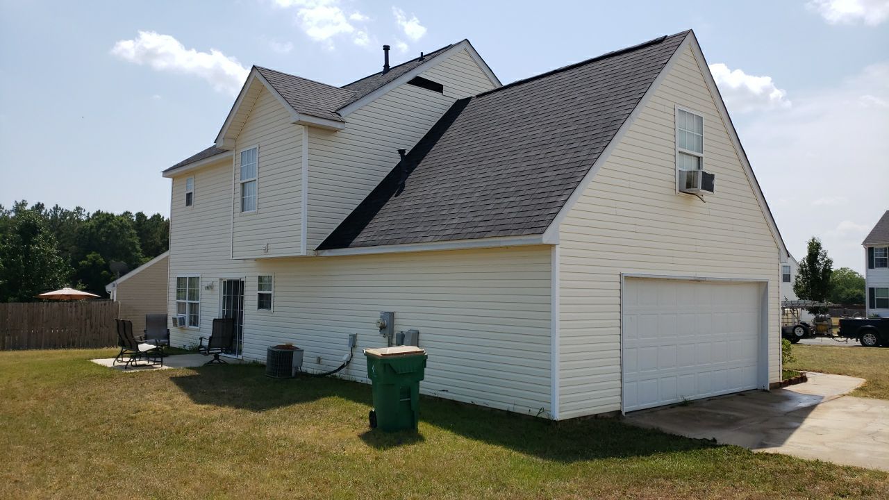 House Wash using cleaner by Power Wash Masters LLC