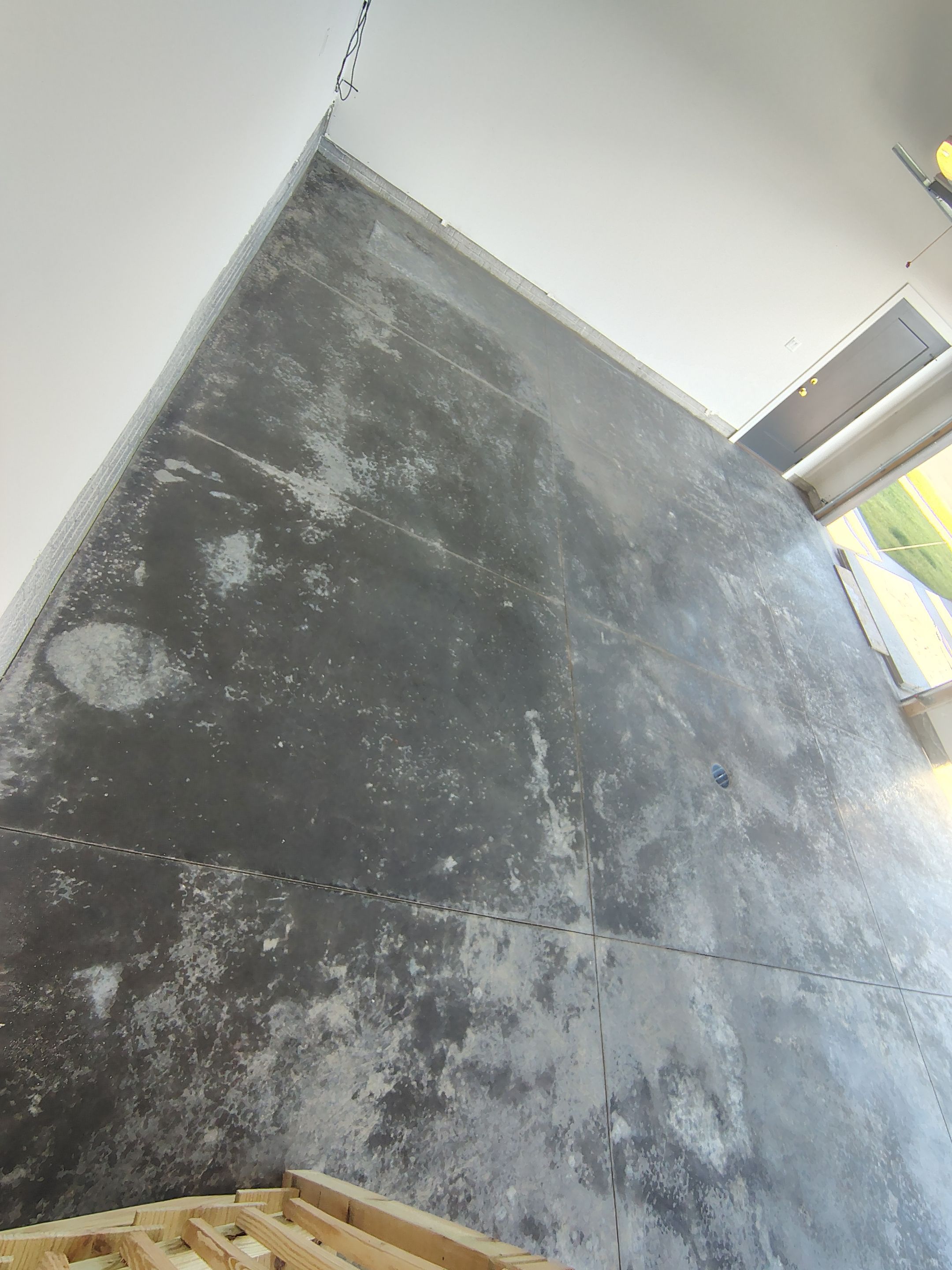 Cabin Fever Decorative Flake Garage Floor Coating in Sioux Falls by Select Painting, Coatings & Garage Cabinets