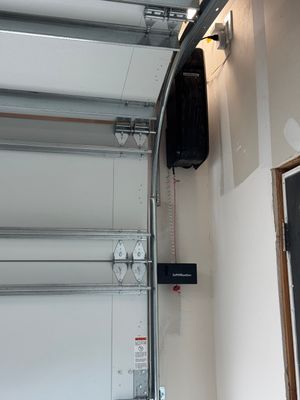 Modern CHI Cedar Garage Door and LiftMaster Opener in Trophy Club