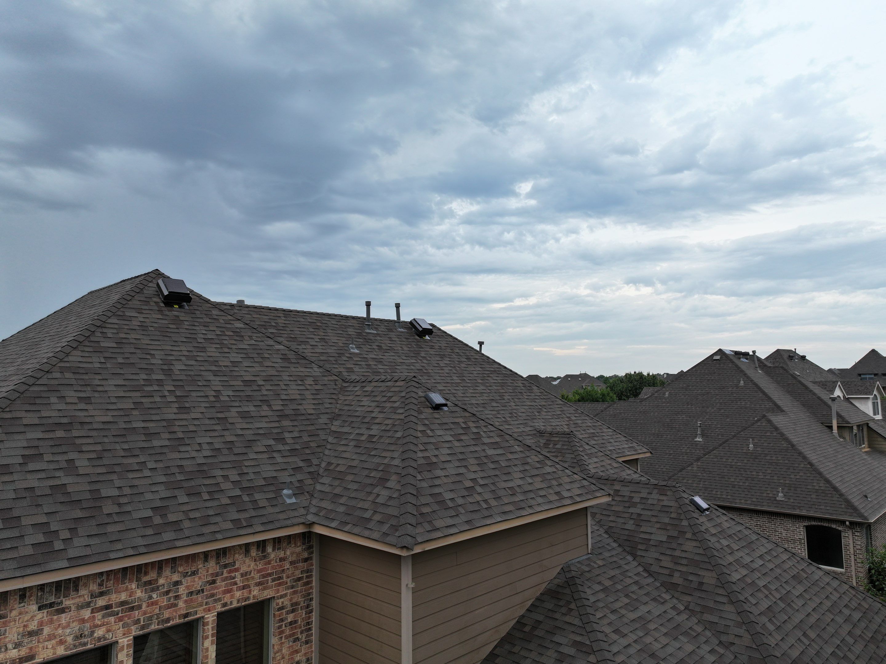 Installing Custom copper turret and Malarkey Vista Class 4 shingles Hail Damage Upgrade by Becker Roofing and Exteriors