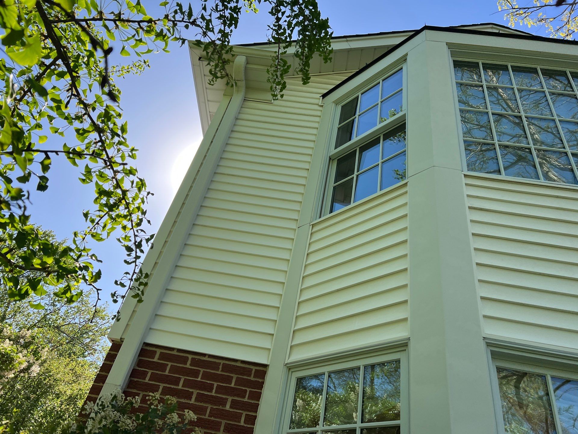 Housewashing  using Algaecide, soft wash soap by Northern Power Washing LLC.