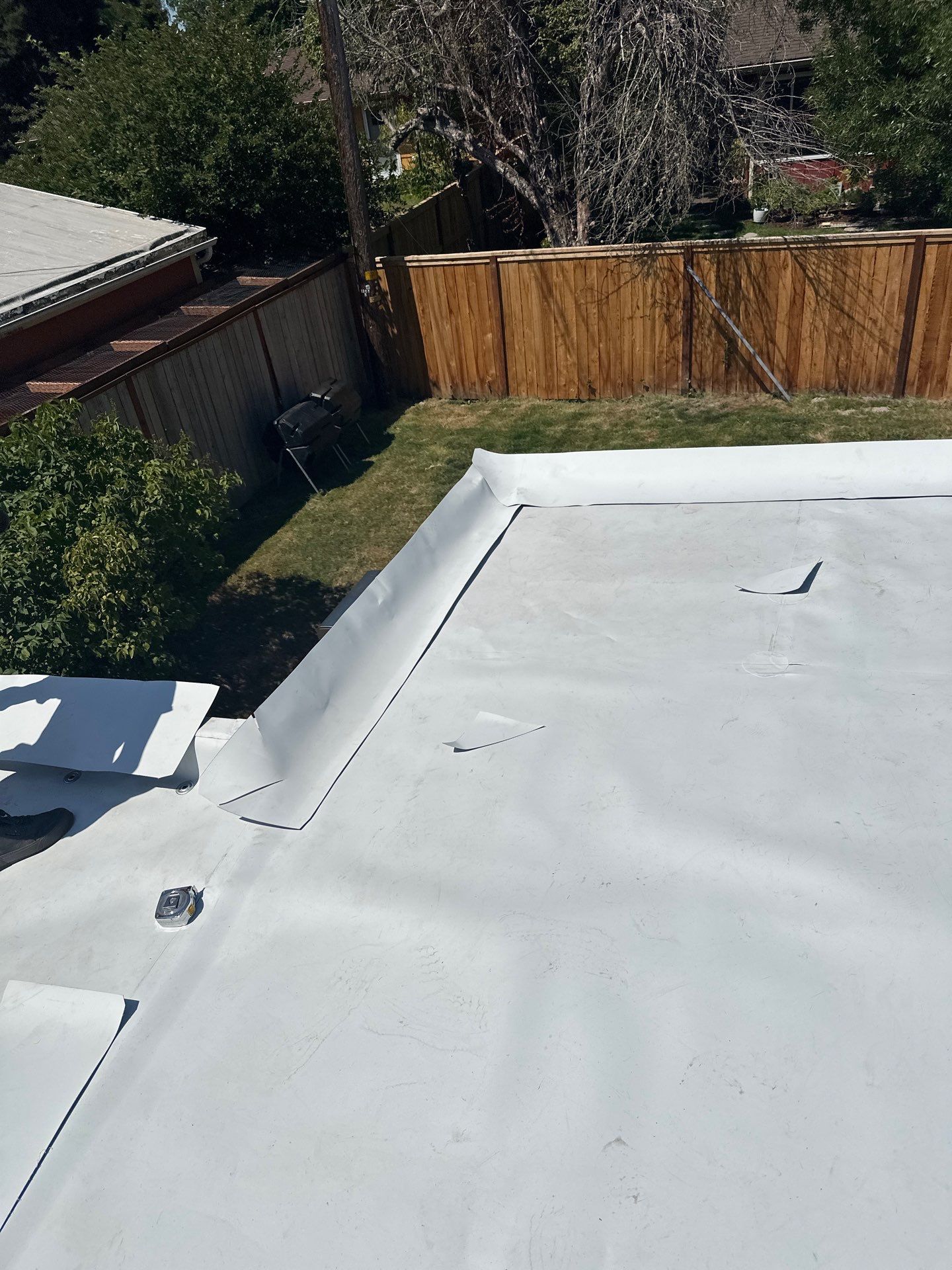 Residential Flat Roof Installation using GAF 60Mil TPO  by Orezona Building & Roofing Company, Inc.