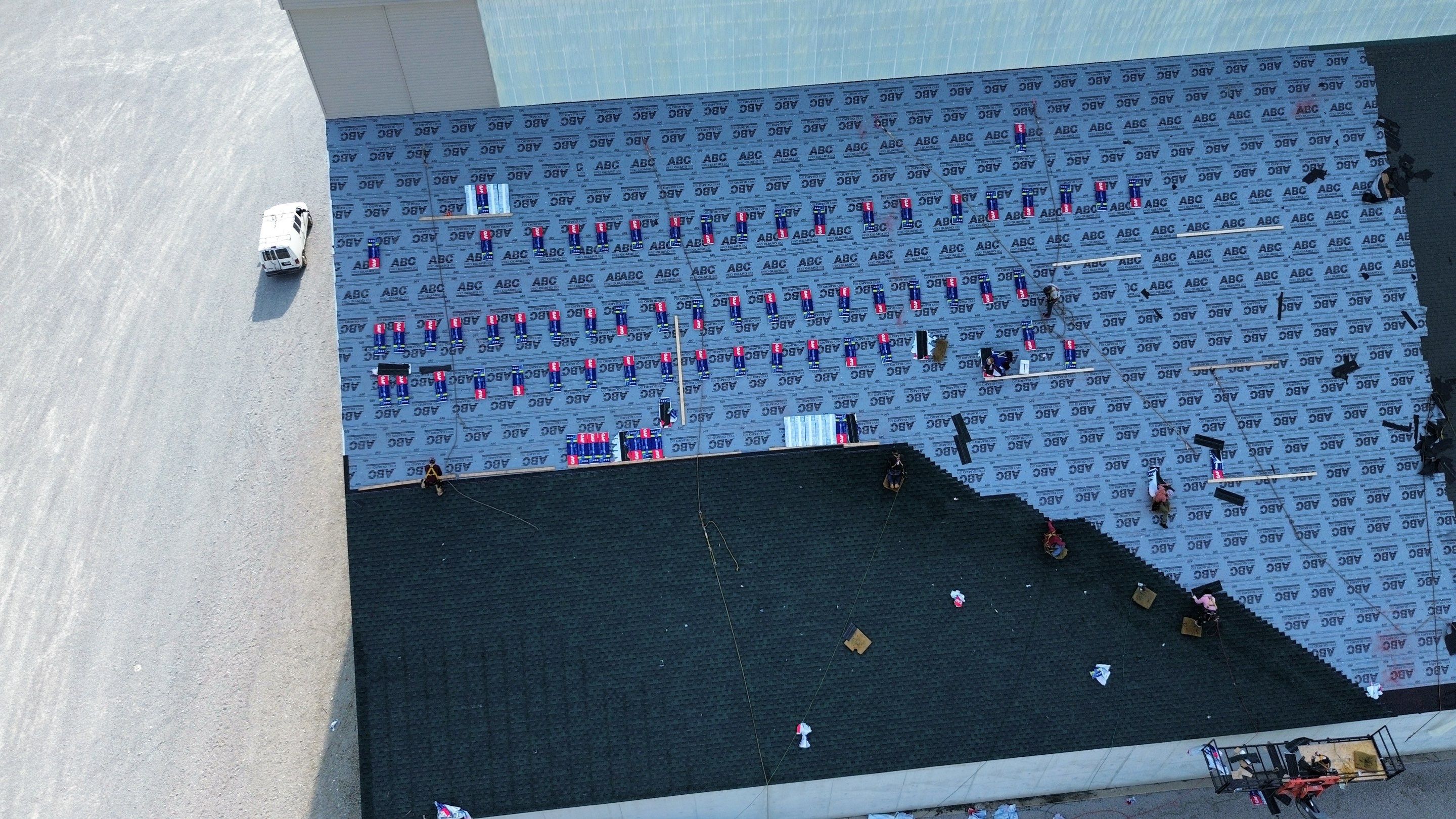 Commercial Roofing Installation using Timberline HDZ Shingles - Hunter Green by RoofX 