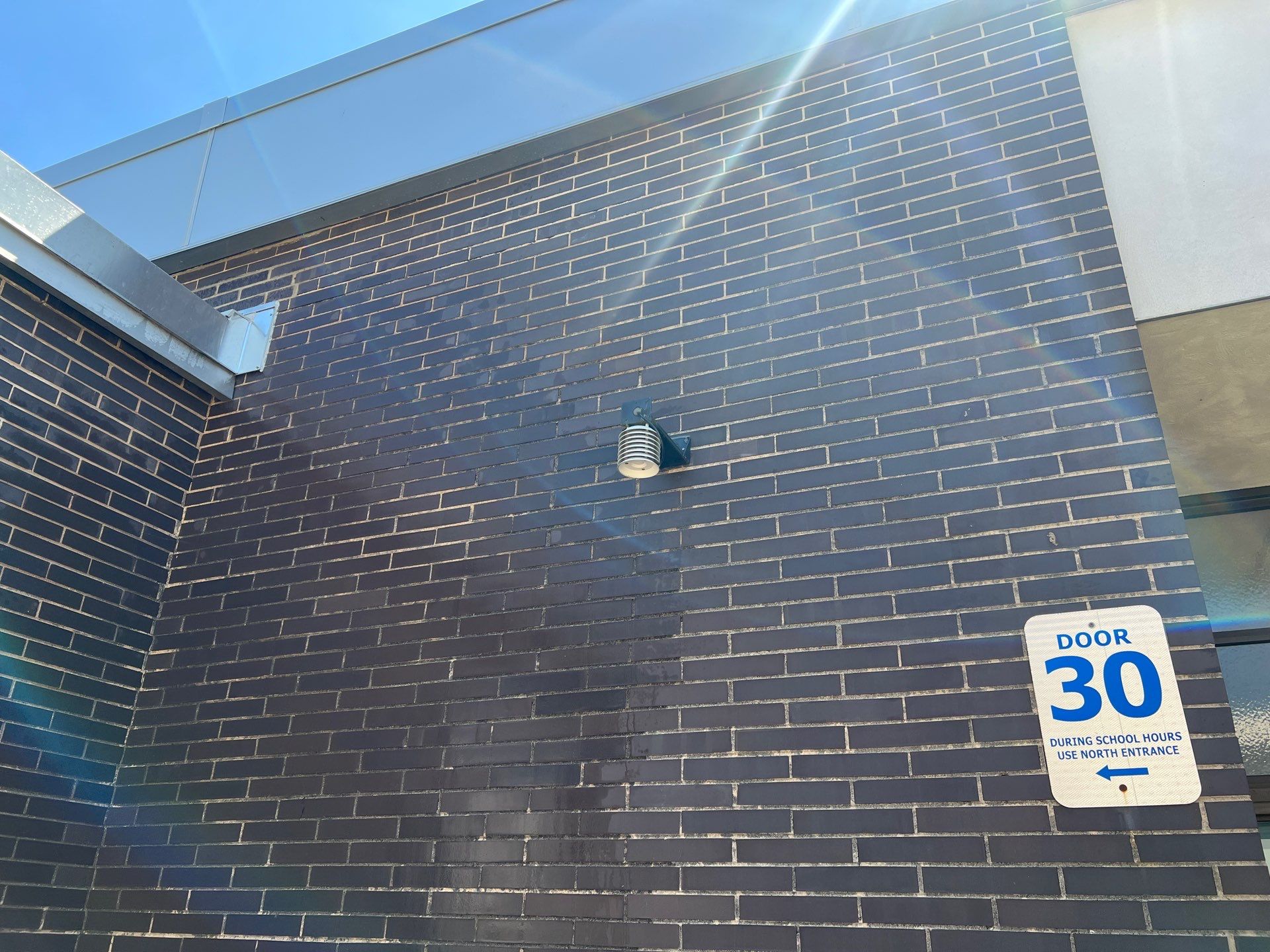 commercial pressure washing using Algaecide, soft wash soap by Northern Power Washing LLC.