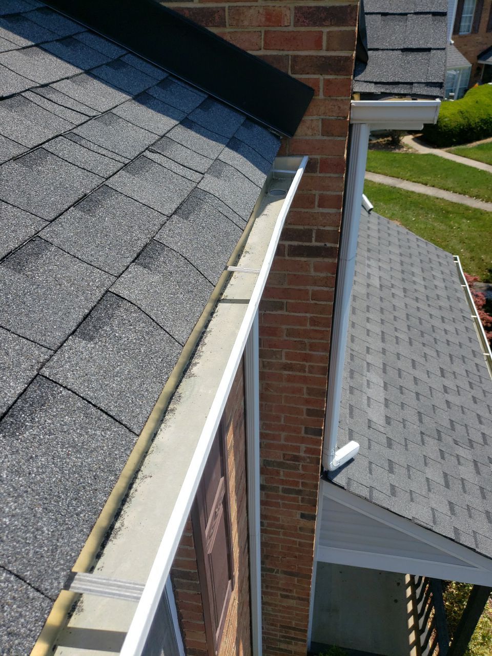 Gutter Cleaning using water by Power Wash Masters LLC
