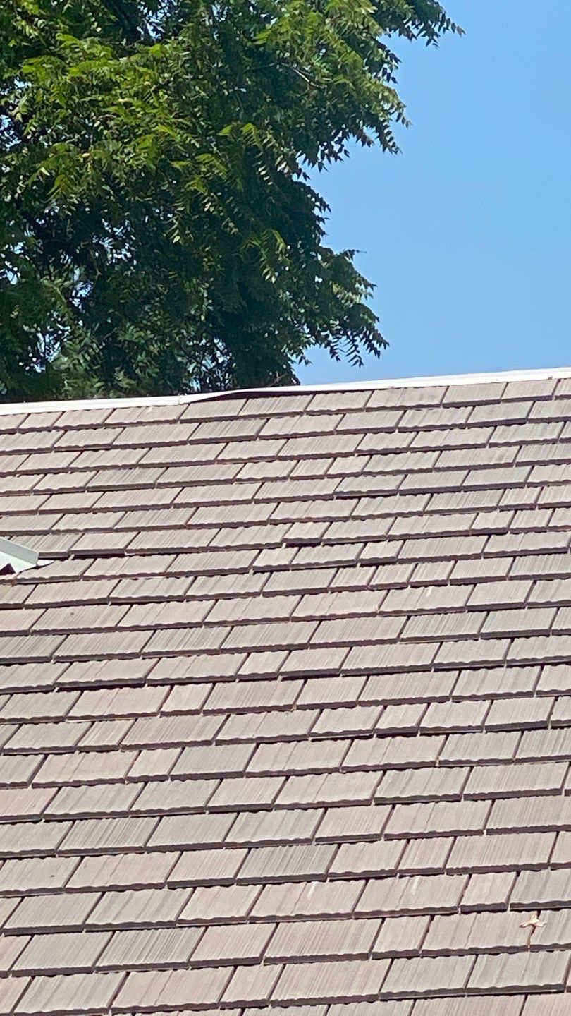 DaVinci Roof Installation with Snow Guards in Oconomowoc Lake by Custom Installations
