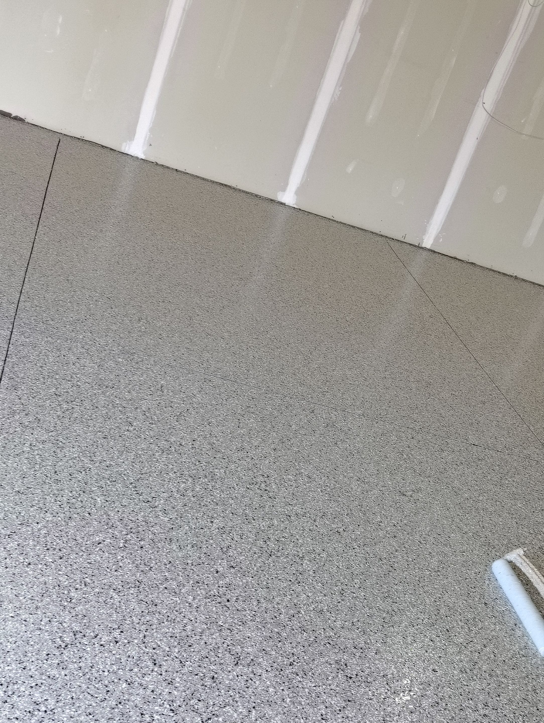 Epoxy Garage Floor Coating with Decorative Flake in Harrisburg by Select Painting, Coatings & Garage Cabinets