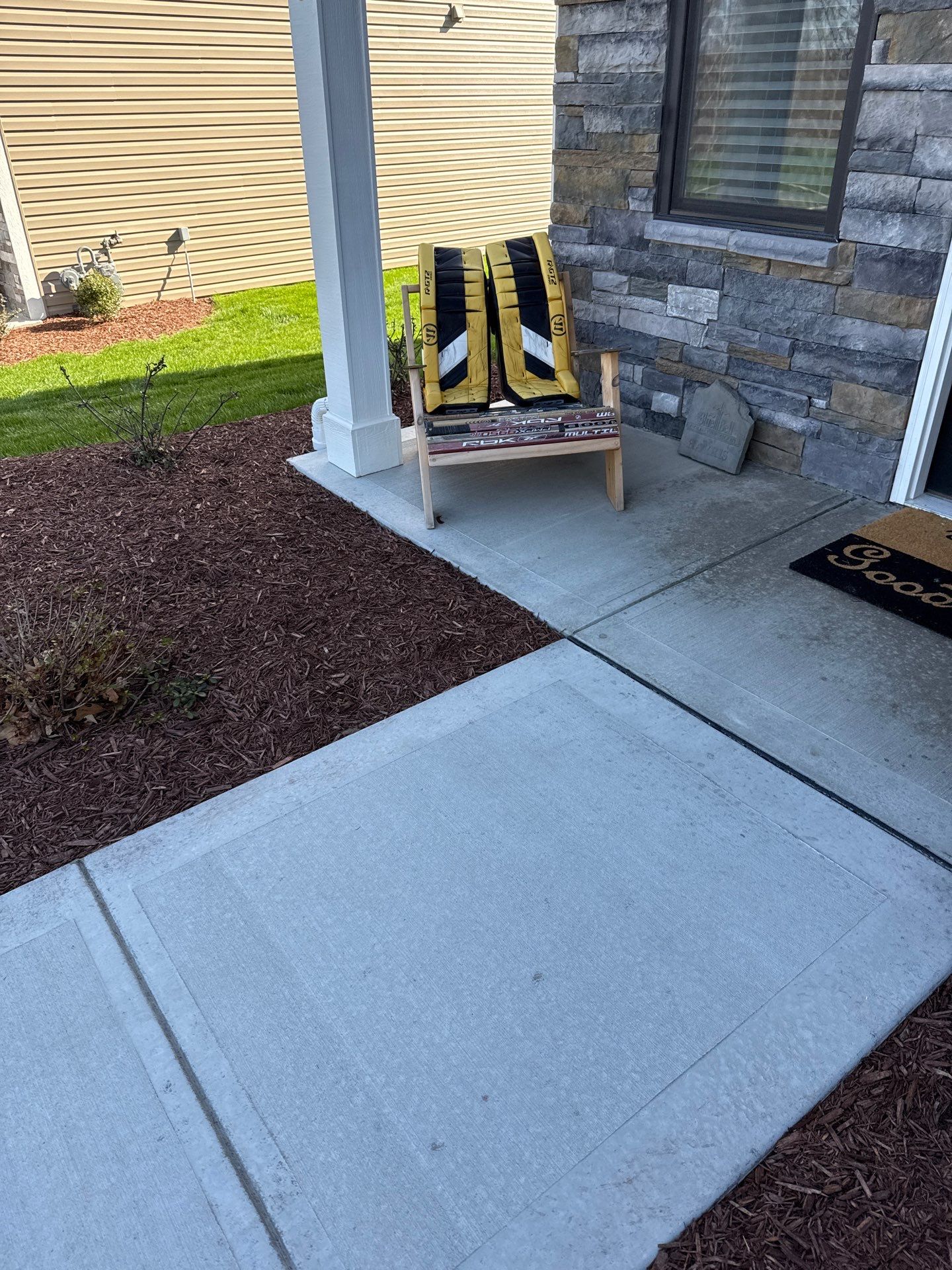 Porch + Garage Project in Evans City by Floors in a Day, Inc