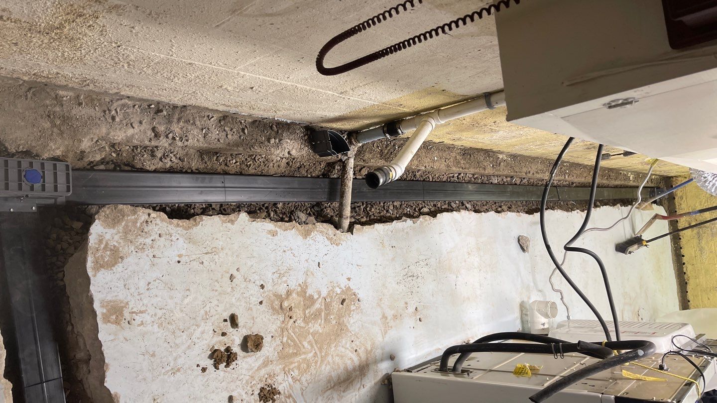 Interior Waterproofing Using GrateDrain™ Products by Toledo Basement Repair 