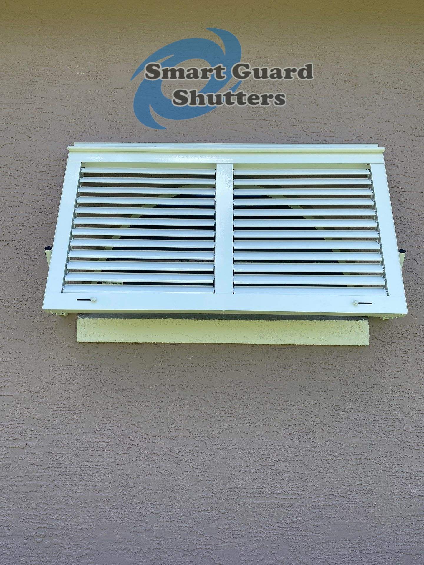 Impact Bahama Shutters in Signal White by Smart Guard Shutters