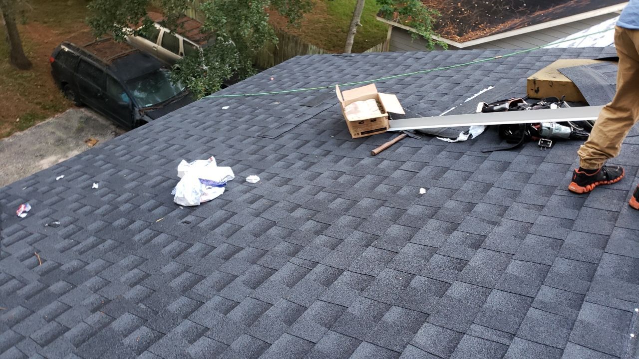 Residential Roofing Installation using Roof Replacement by American Roofing & Construction LLC