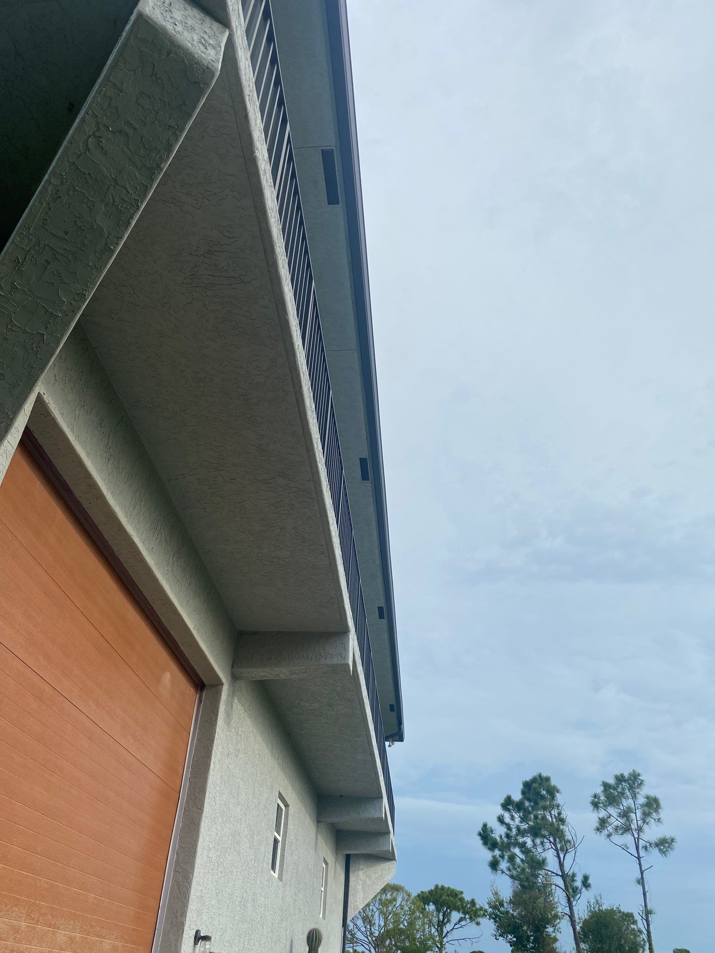 Black Seamless Gutters St. James City by Gutter Professors