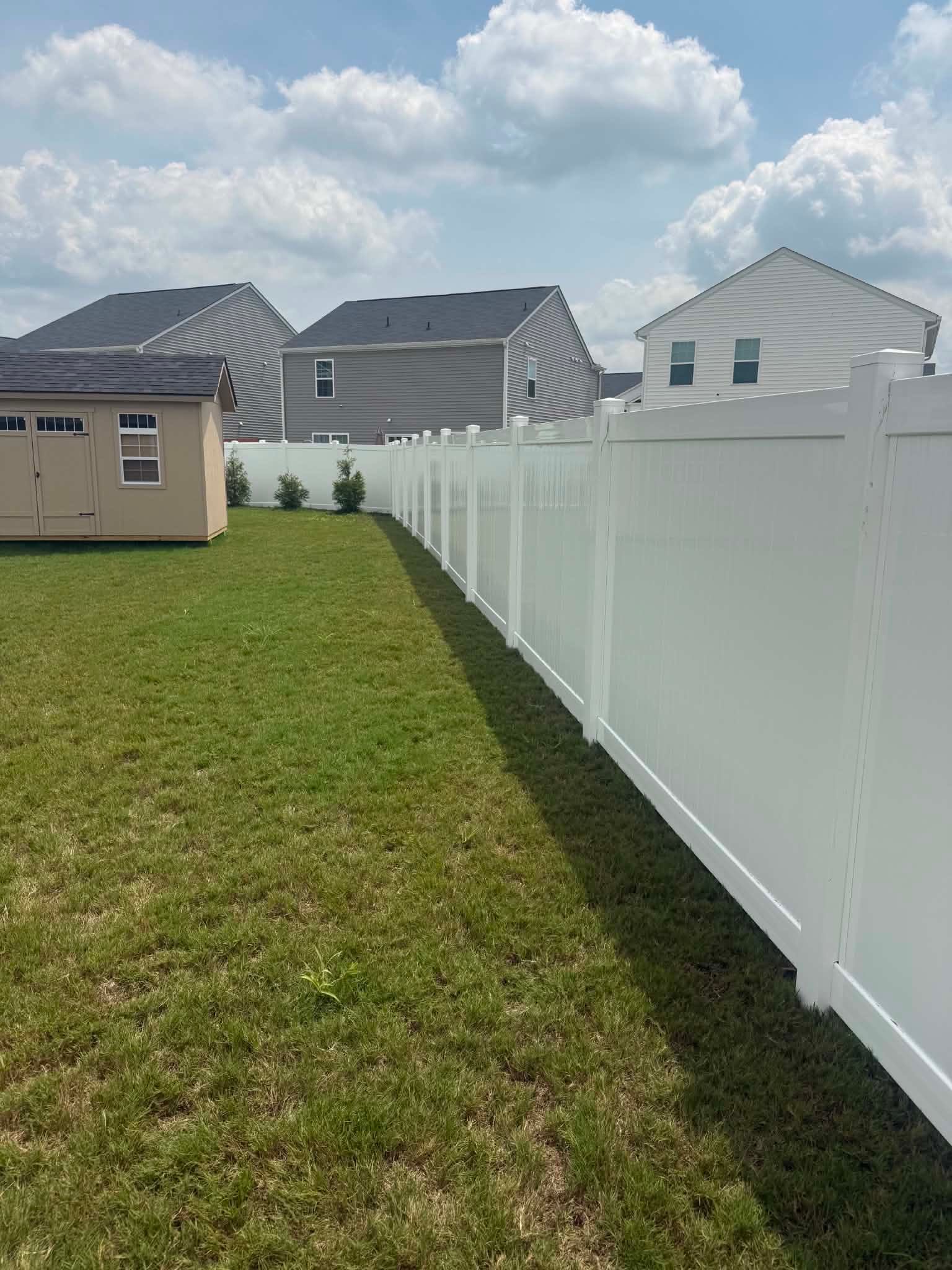 Vinyl Privacy Fence Installation for Greenville Residence by Superior Fence and Rail