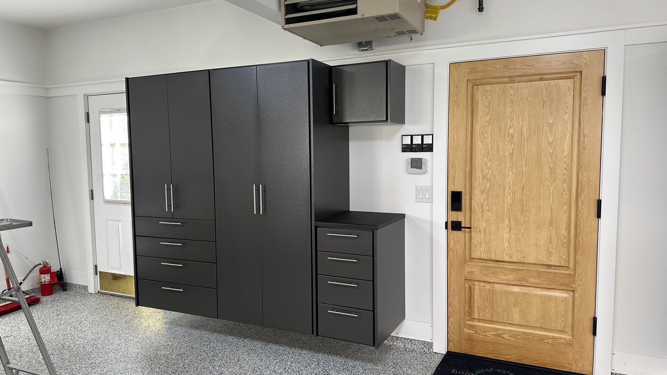 Jim P. upgraded his garage with cabinets  by Banner Garage