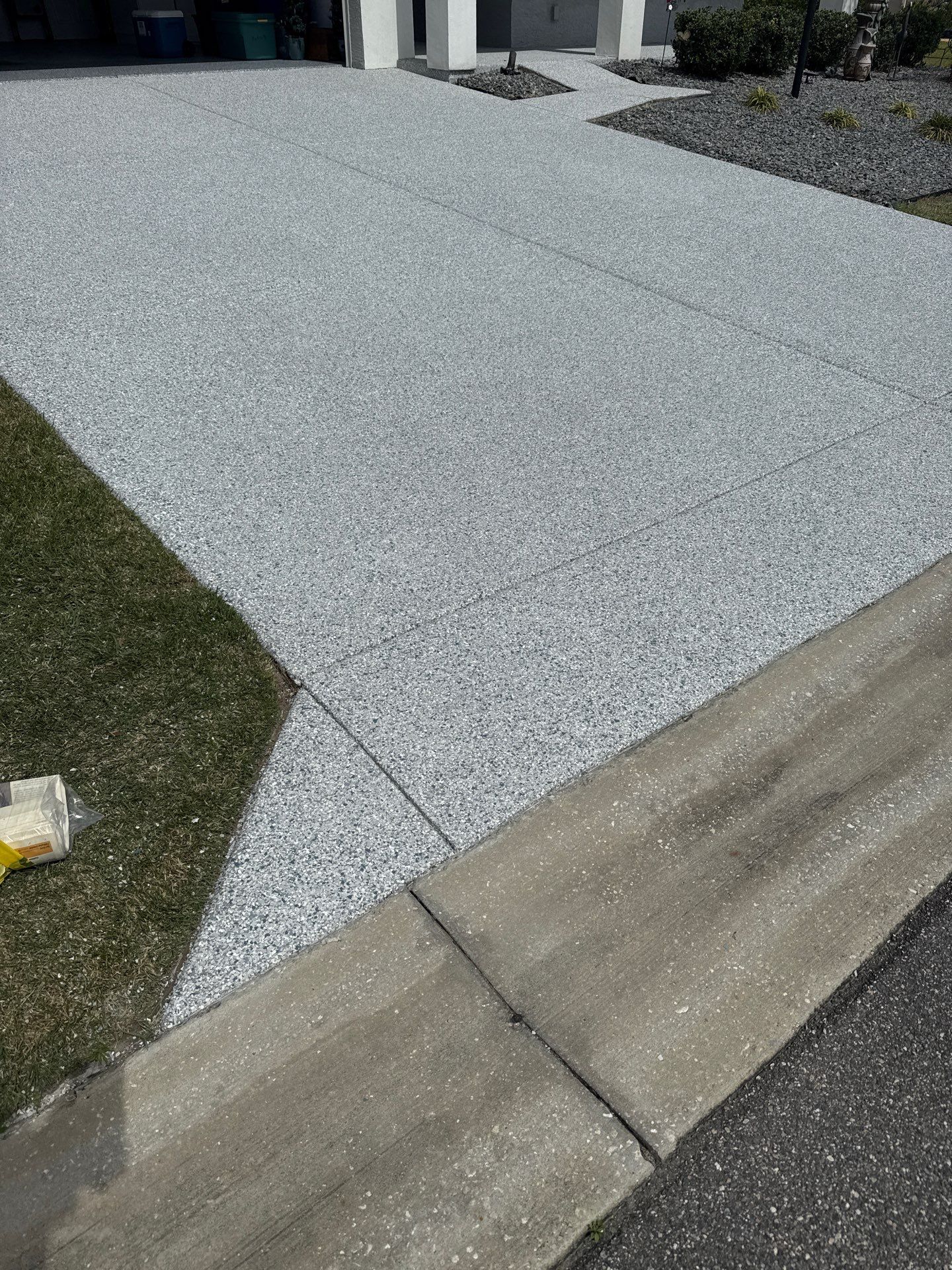 Driveway with Border Slatestone  by Innovative Concrete Coatings 
