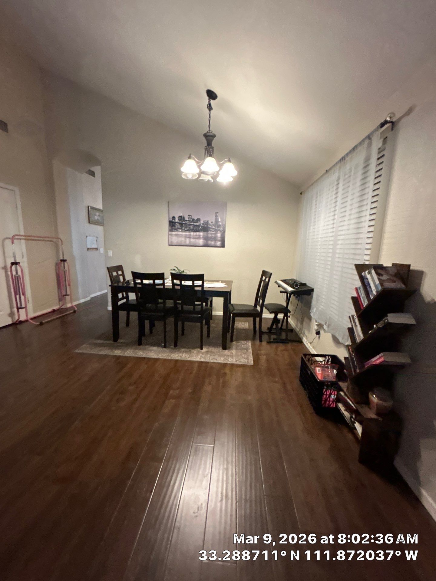 Interior Dining Room Renovation with Dark Wood Flooring by CompanyCam Sales Demo