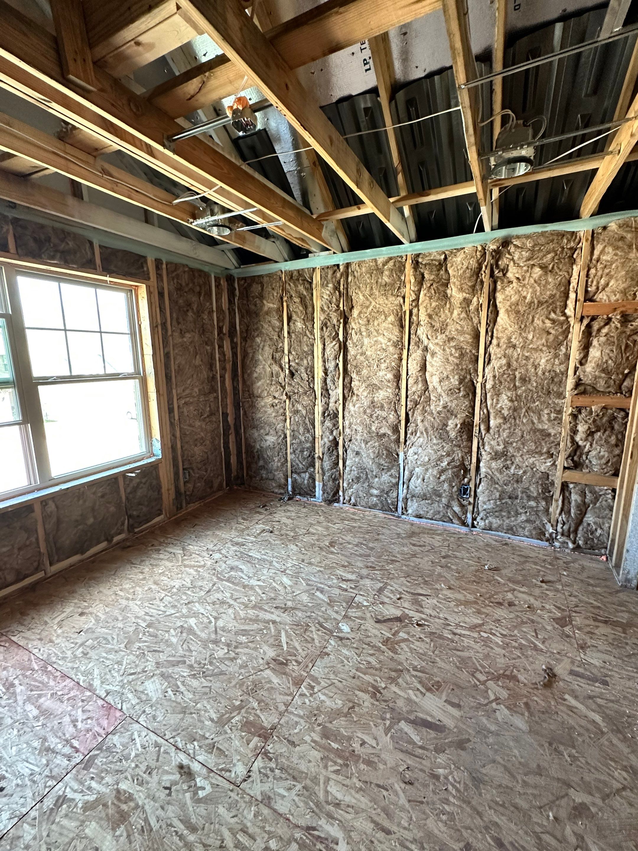 Fiberglass batt install on new construction home in Ft Worth by Apex Insulation Solutions