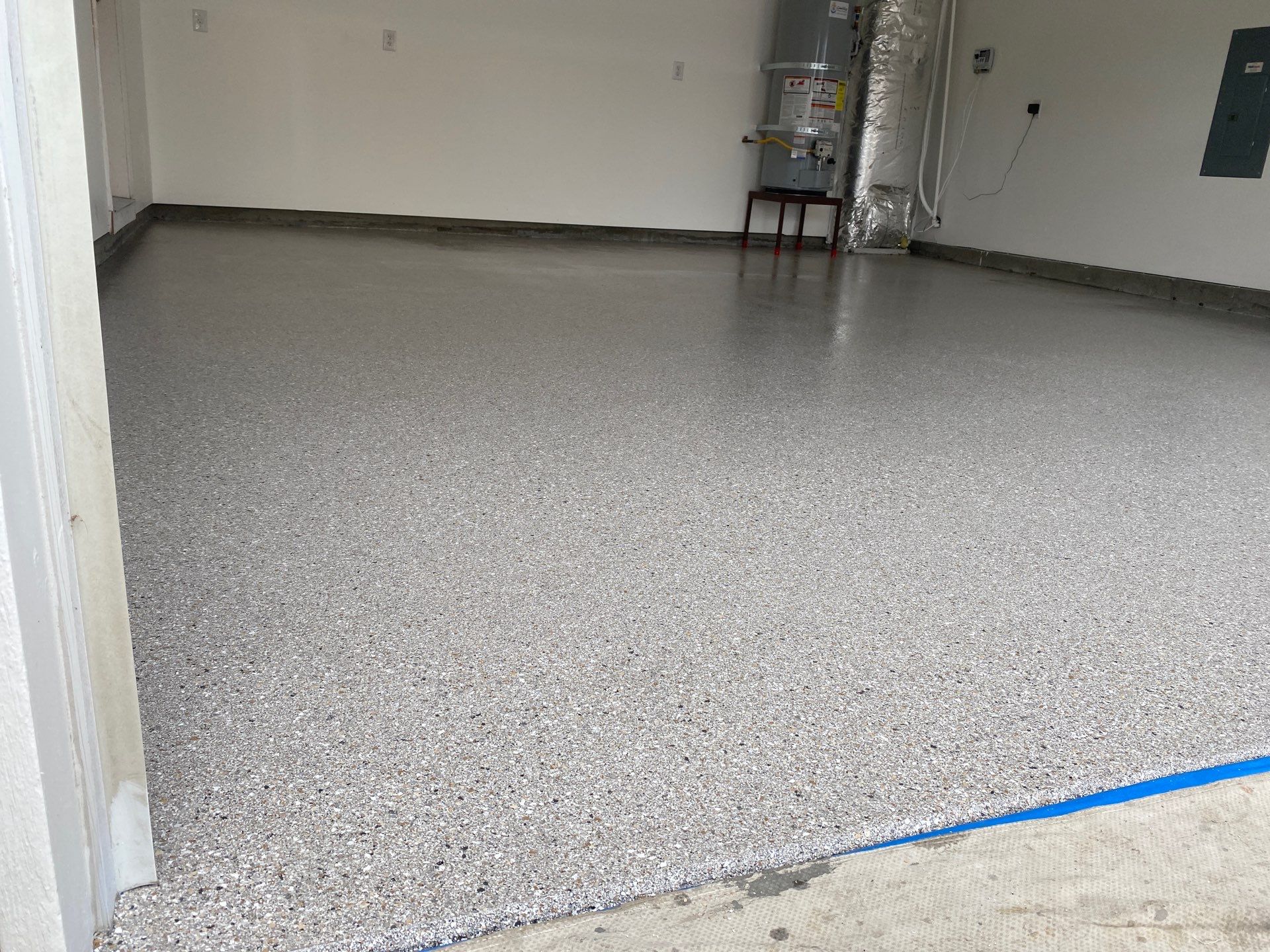 Garage Transformation using Claystone Hybrid by Croc Coatings, LLC