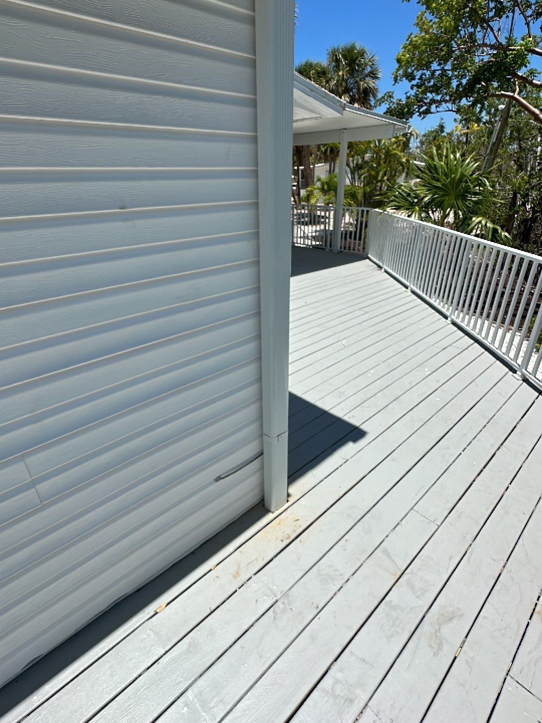 Downspout Installation using Charcoal Grey in Sanibel FL by Gutter Professors
