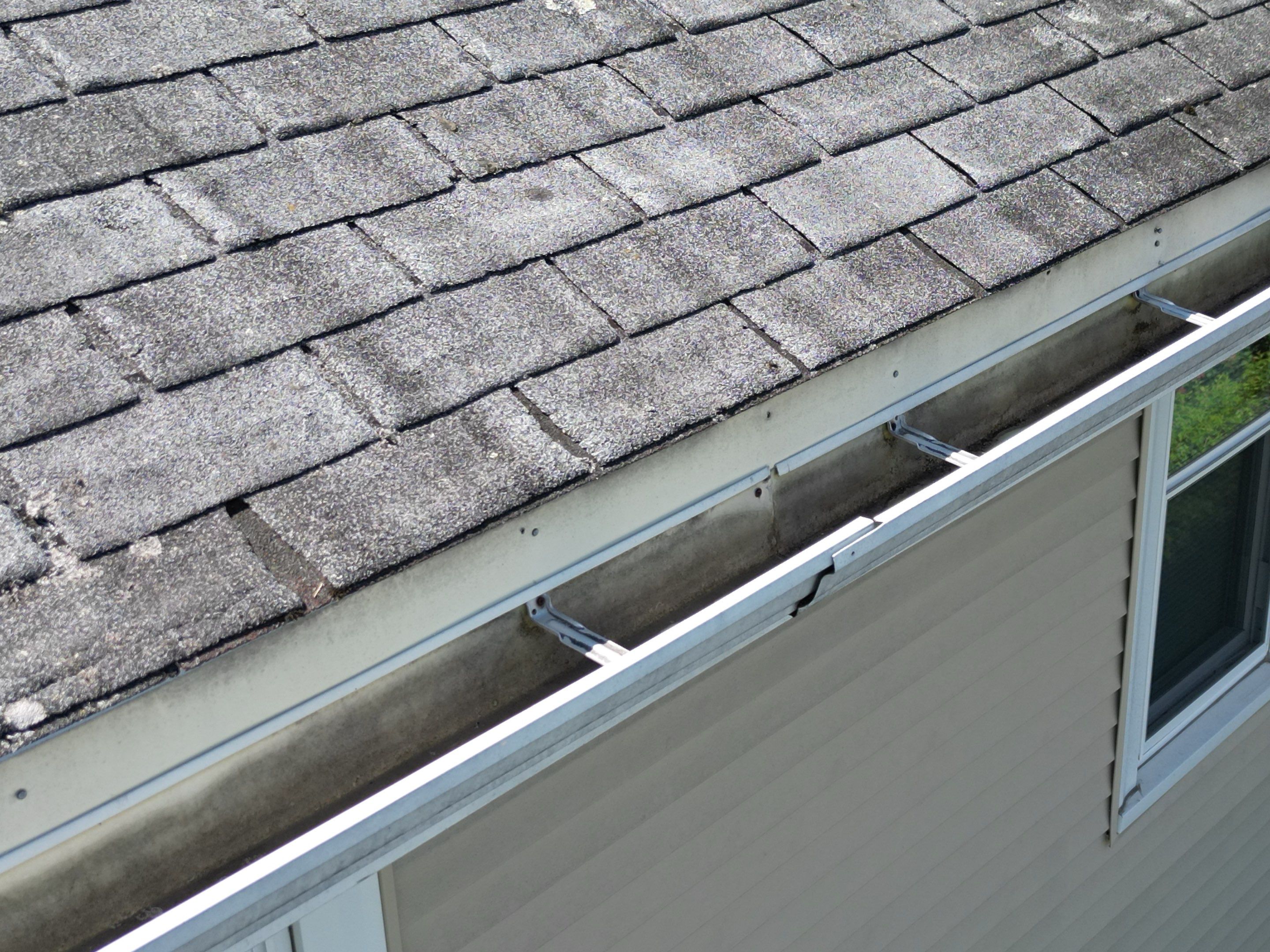 Roof Replacement with Skylight Flashing in Waltham, MA by Mighty Dog Roofing of Greater Middlesex County