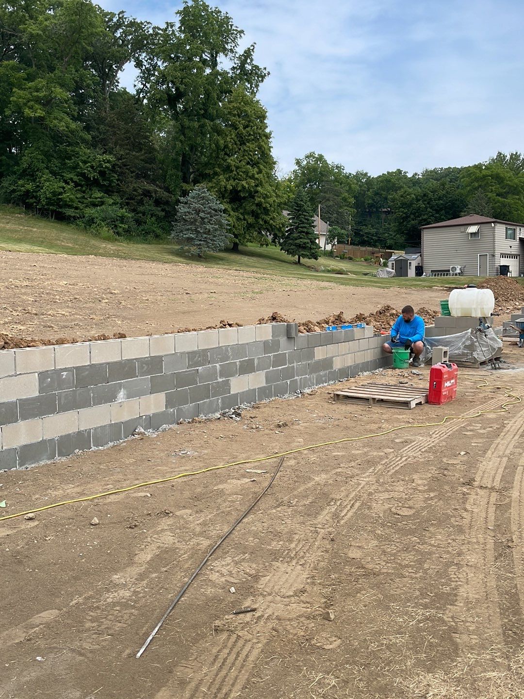 Fence / Retaining Wall using Block then parge by ACE Waterproofing & Basement Solutions