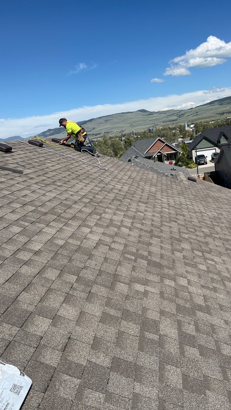 Residential Roofing Installation using IKO Weatherwood shingle by Top Notch Roofing Inc