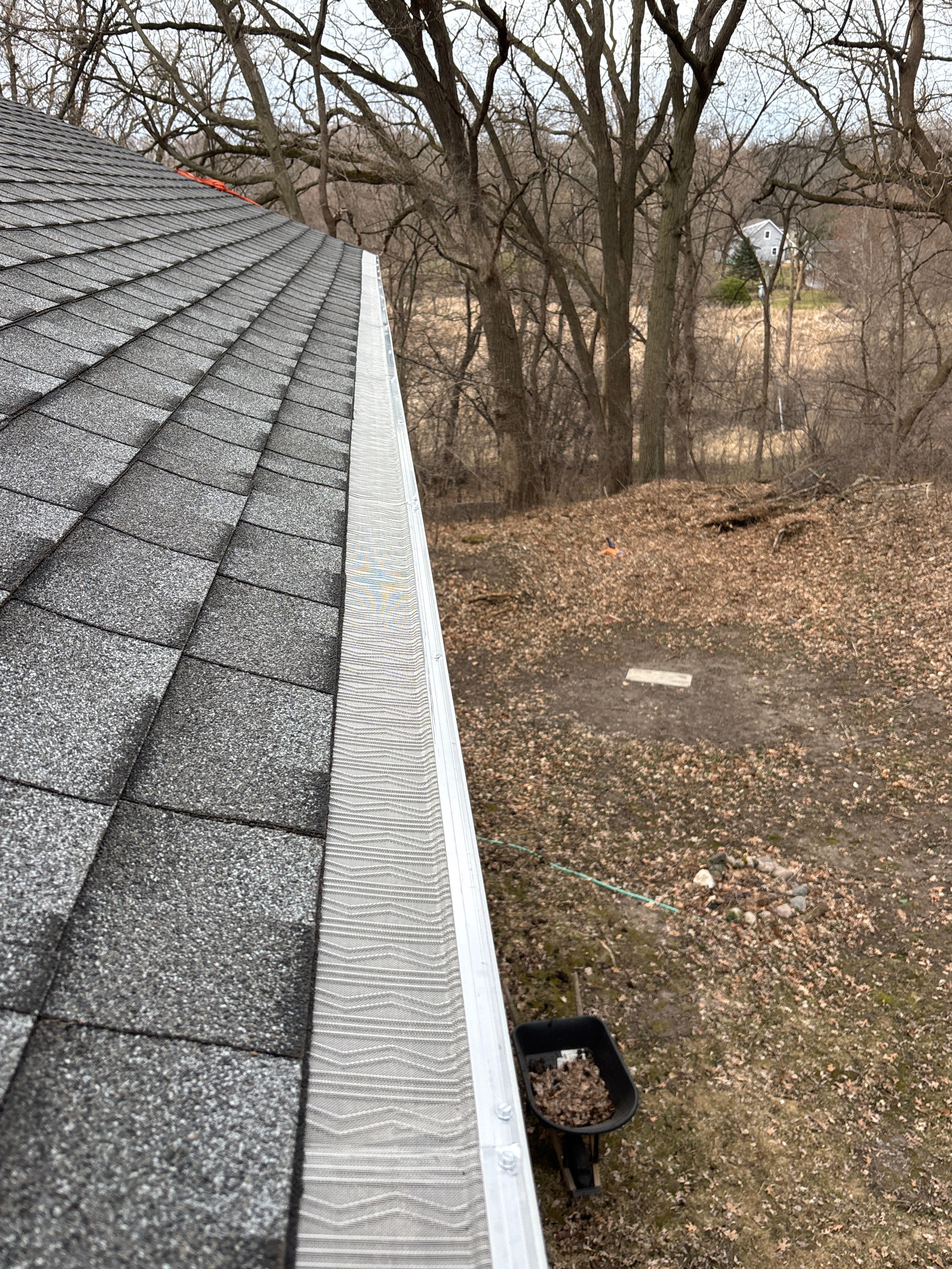 Minnetonka Gutter Cleaning and Leaf Blaster Pro Gutter Guard Installation by Next Level Seamless Gutters / Exteriors Inc.