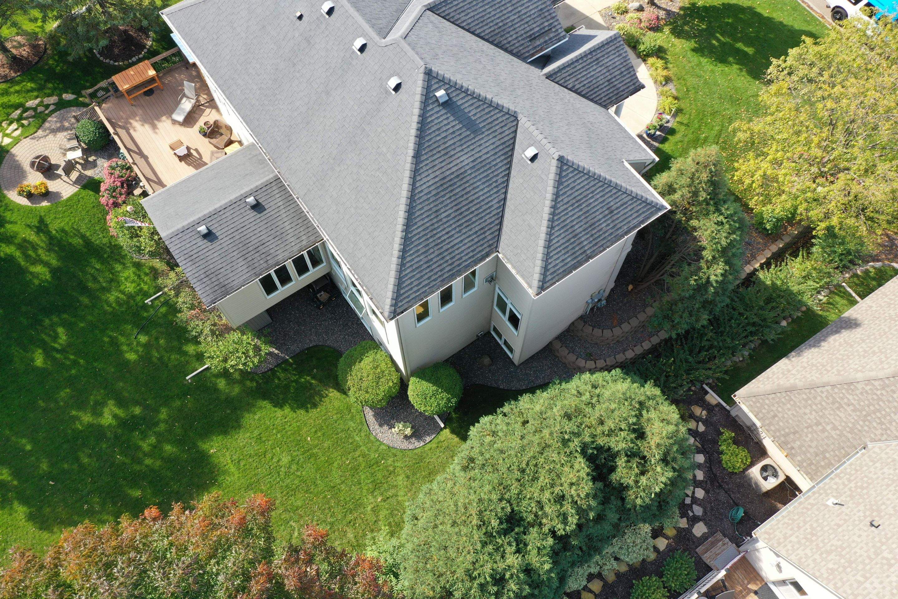 Residential Roofing Installation using Certainteed Landmark Moire Black by MODERN EXTERIOR SYSTEMS