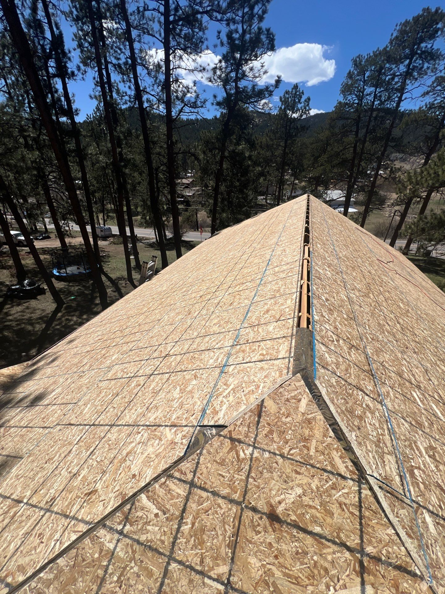 Residential Roofing Installation using Standing Seam Metal by Blue Peaks Roofing LLC 