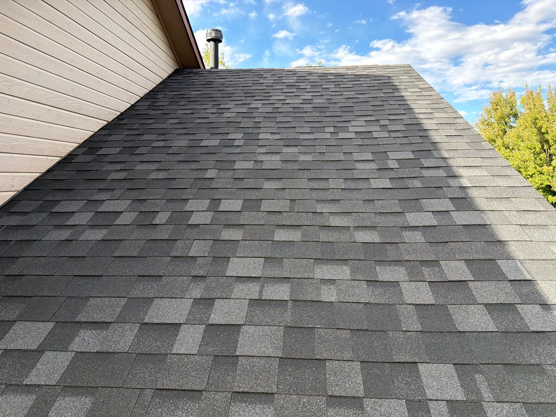 Residential Roof Replacement in Meridian Featuring Charcoal Architectural Shingles by Olive Roofing