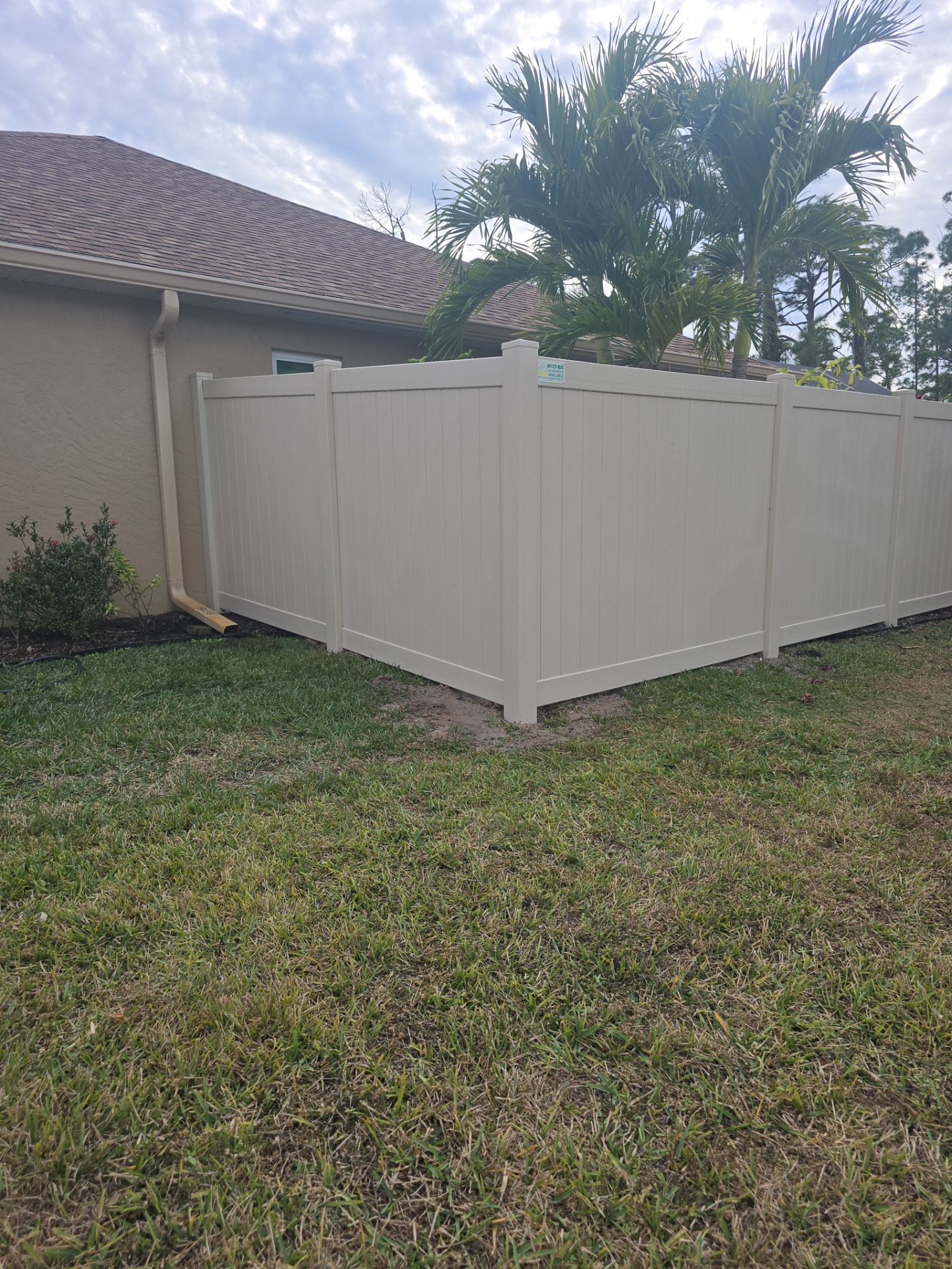 Tan Vinyl Fence in North Port by True Fence LLC