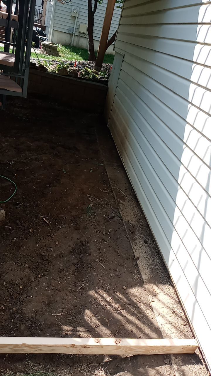 Back Yard Paver Patio by LAND ESCAPES LLC