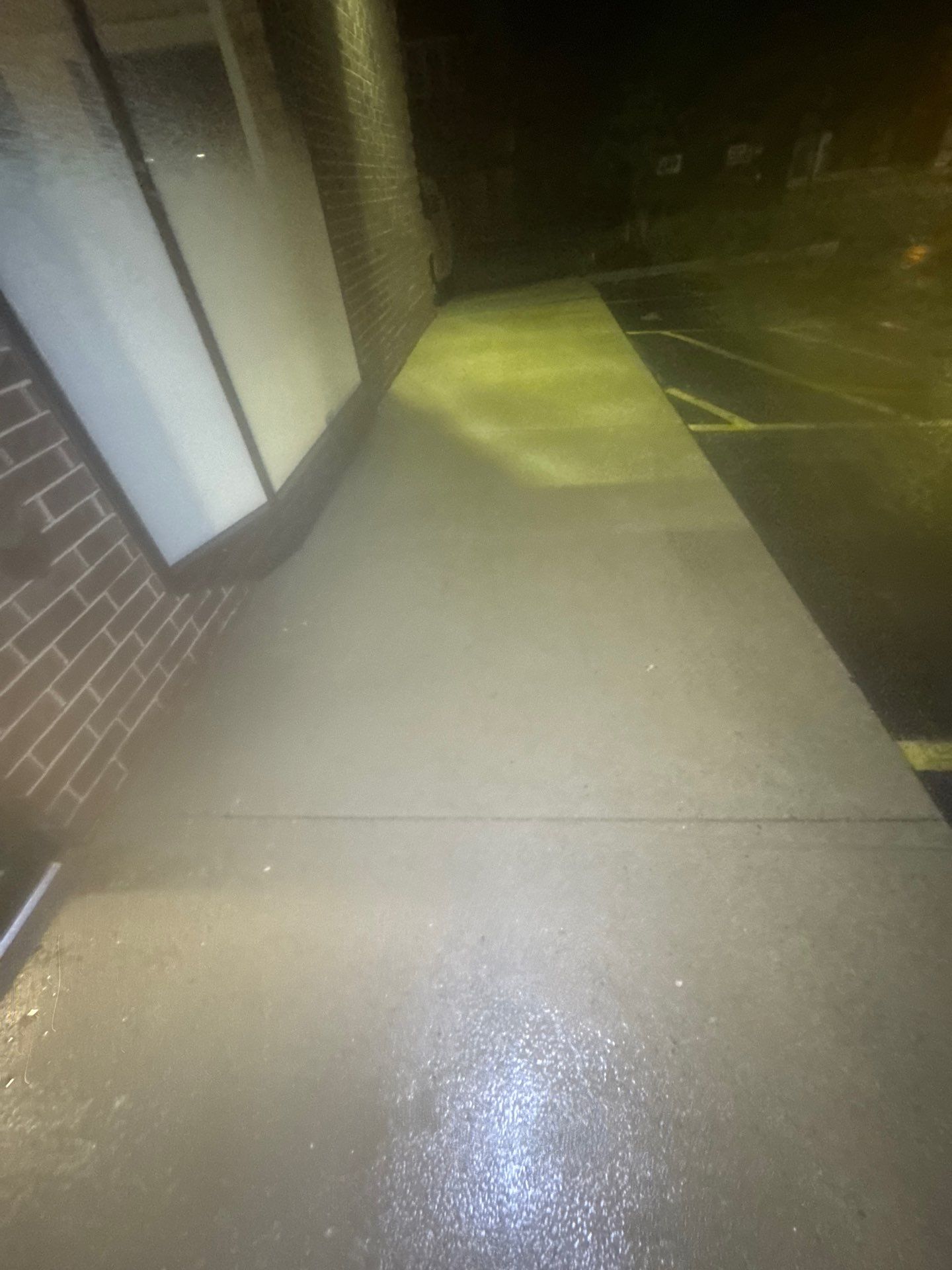Commercial sidewalk cleaning. by Northern Power Washing LLC.