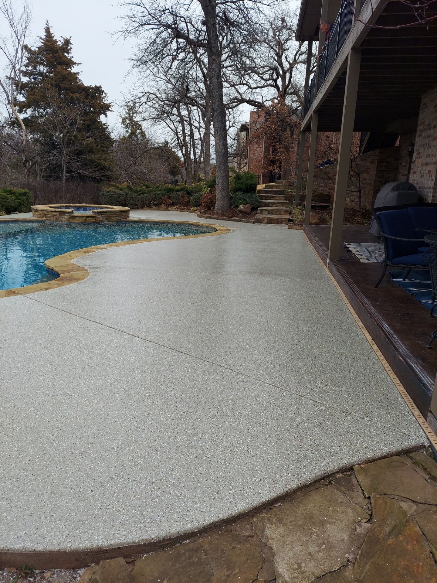 Pool Deck Install with Pebble Beach by Copperhead Coatings