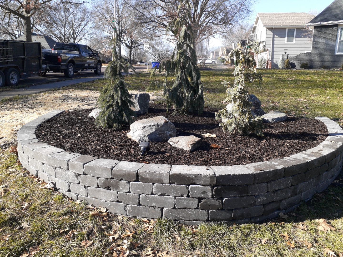Entire Home Landscape and Retaining Walls by LAND ESCAPES LLC