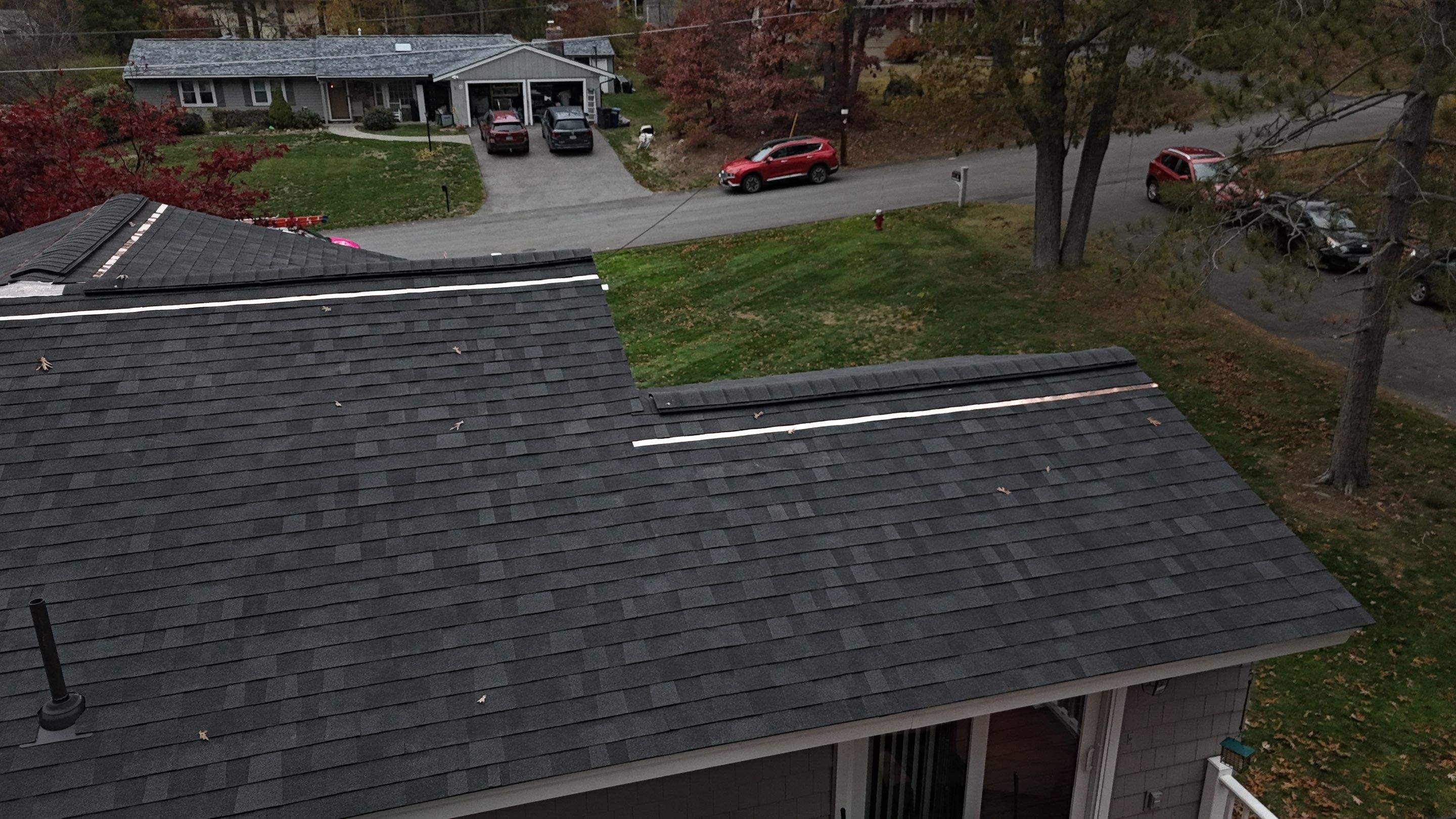 Chelmsford Complete Roof Replacement in Onyx Black with Balanced Ventilation by Mighty Dog Roofing of Greater Middlesex County