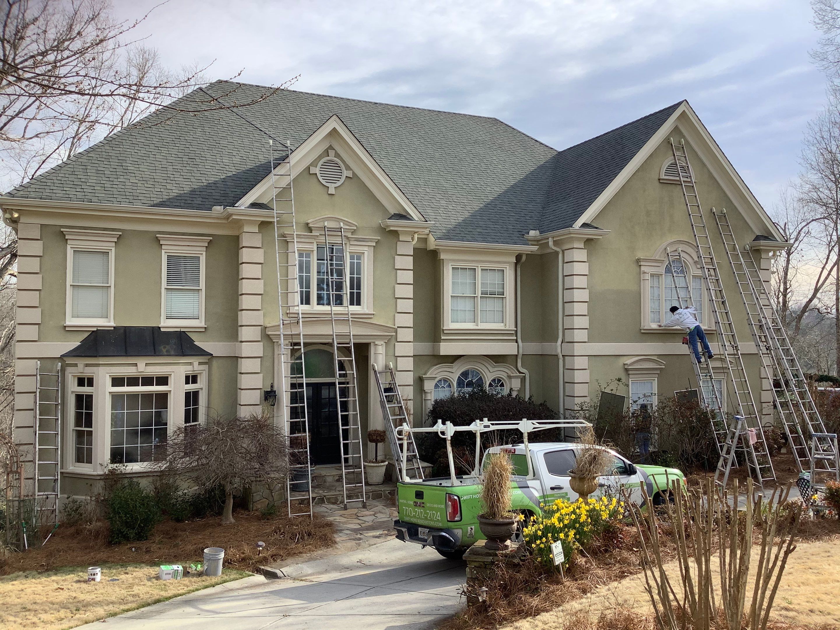 Exterior Stucco Painting and White Trim Update in Roswell by Swift Home Renovations