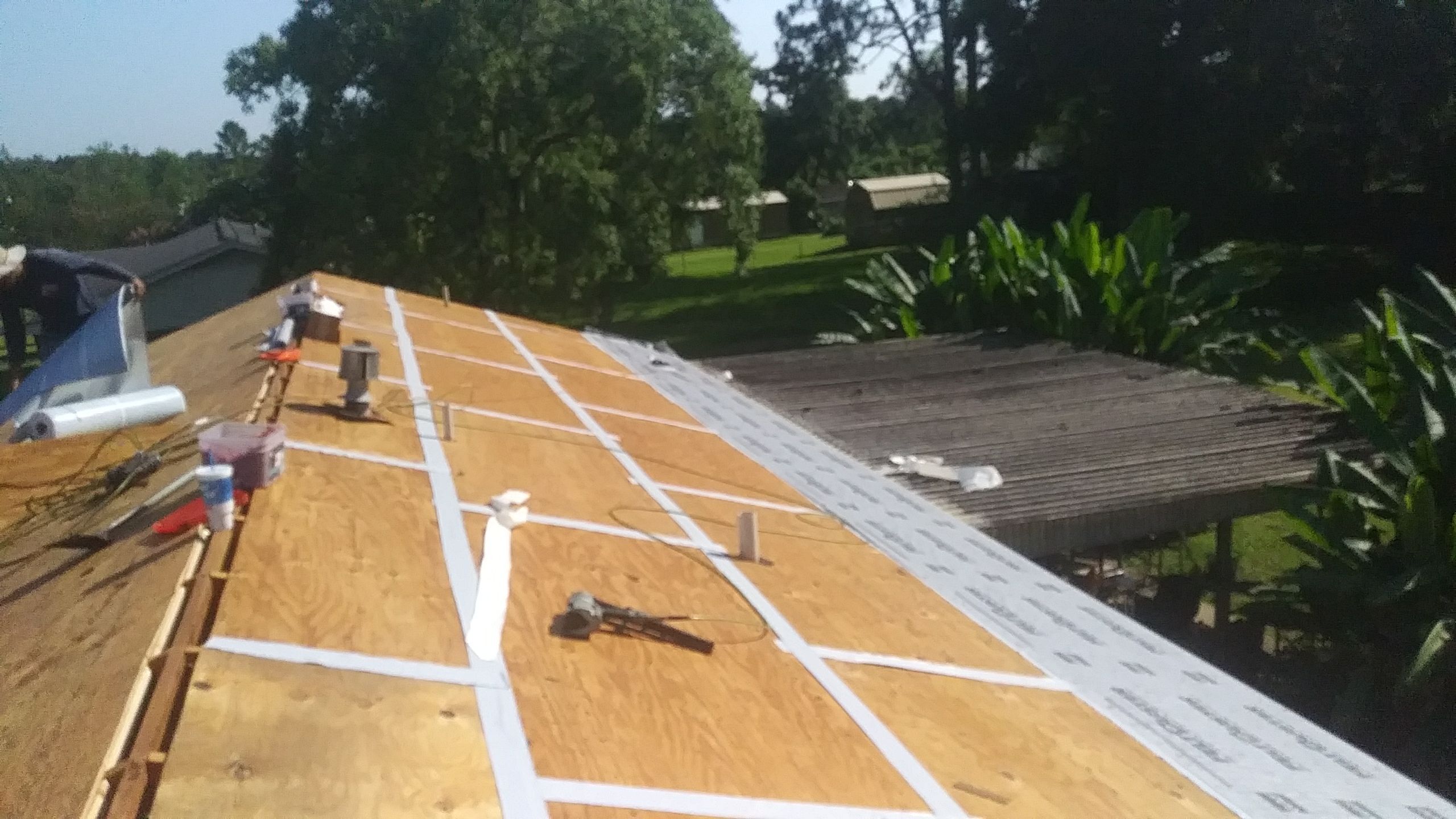 Residential Roofing Installation using Roof Replacement by American Roofing & Construction LLC