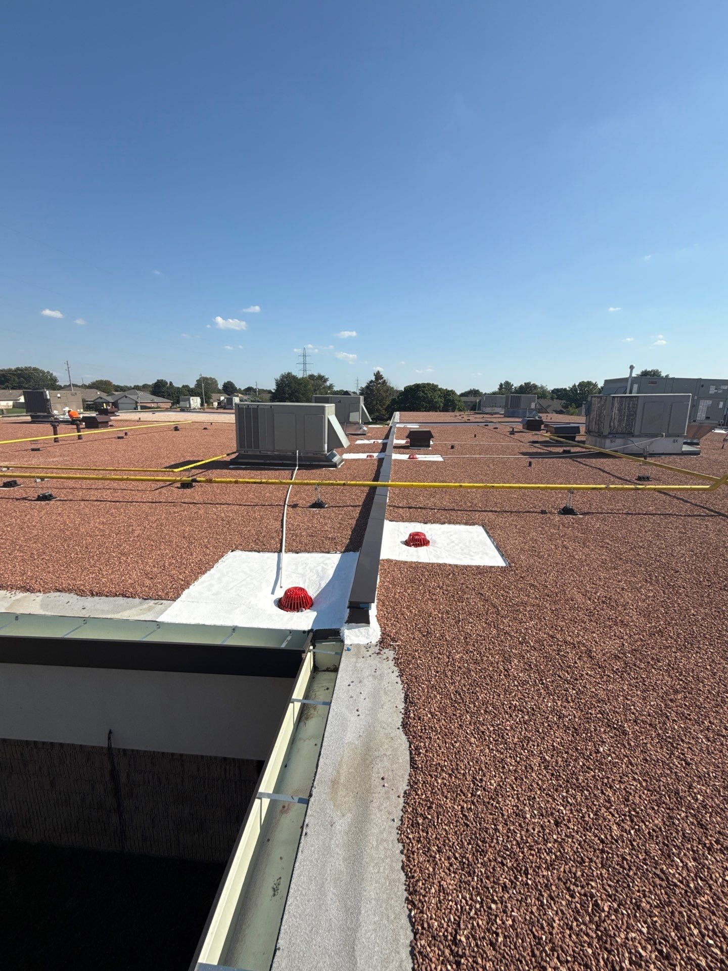 Mills Elementary School Commercial Re-Roof and Moisture Protection by Secondary Rhodes
