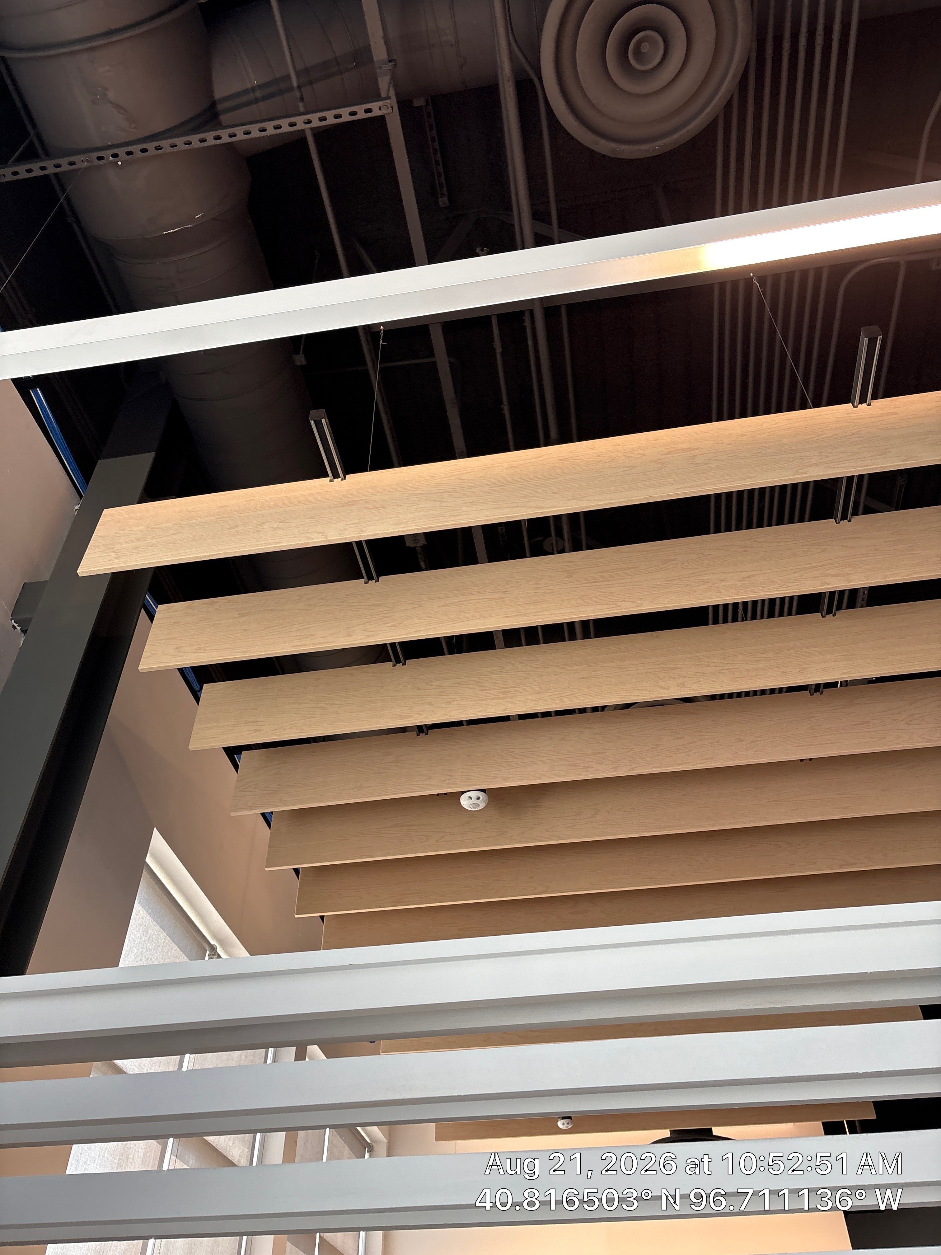 Lincoln Office Renovation Featuring Architectural Wood Baffles and Window Repair by CompanyCam Sales Demo