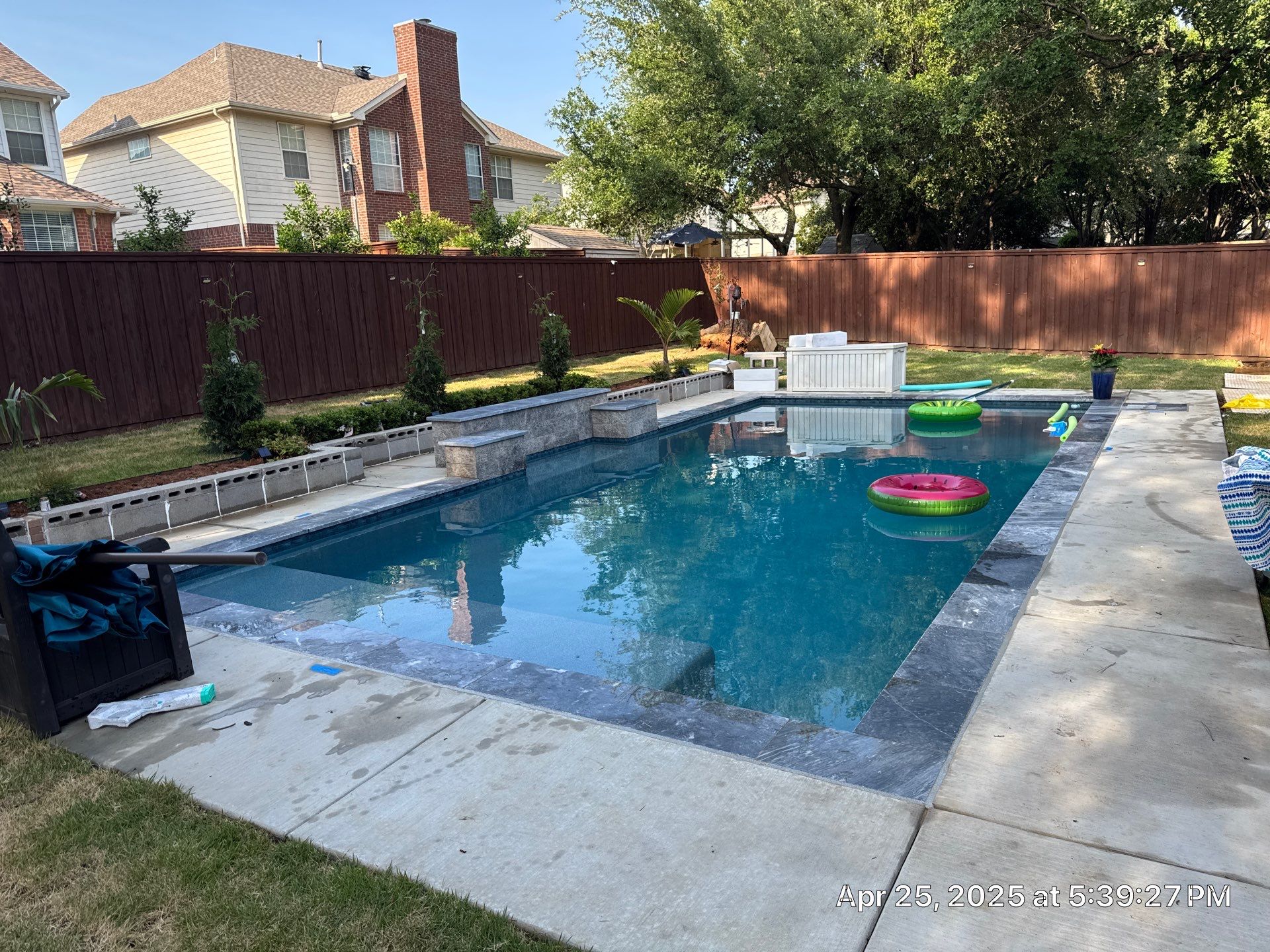 Geometric Pool with Raised Water-Feature Wall by Pinnacle Pools and Spas - DFW