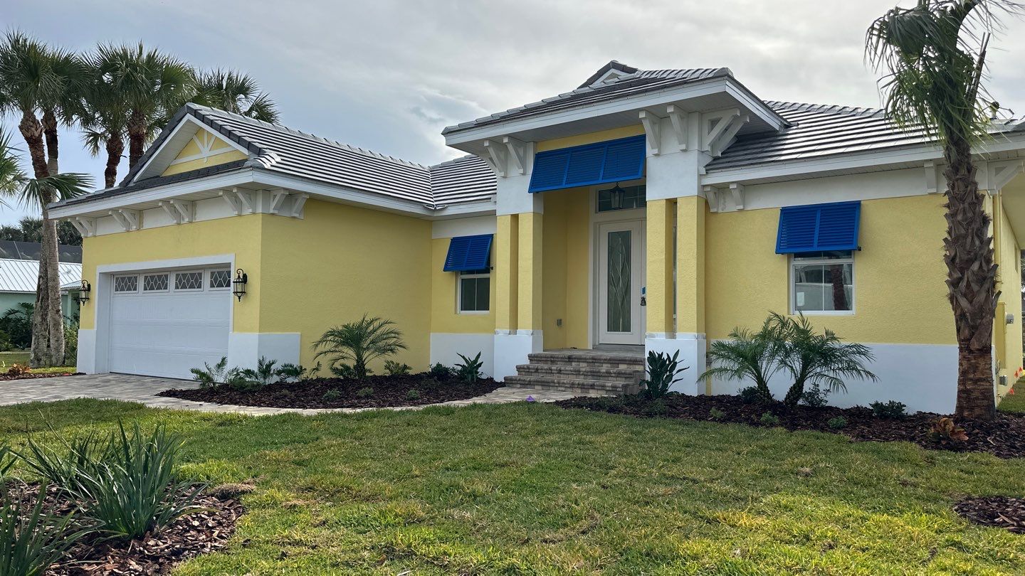 Bahama Shutters in Traffic Blue by Smart Guard Shutters